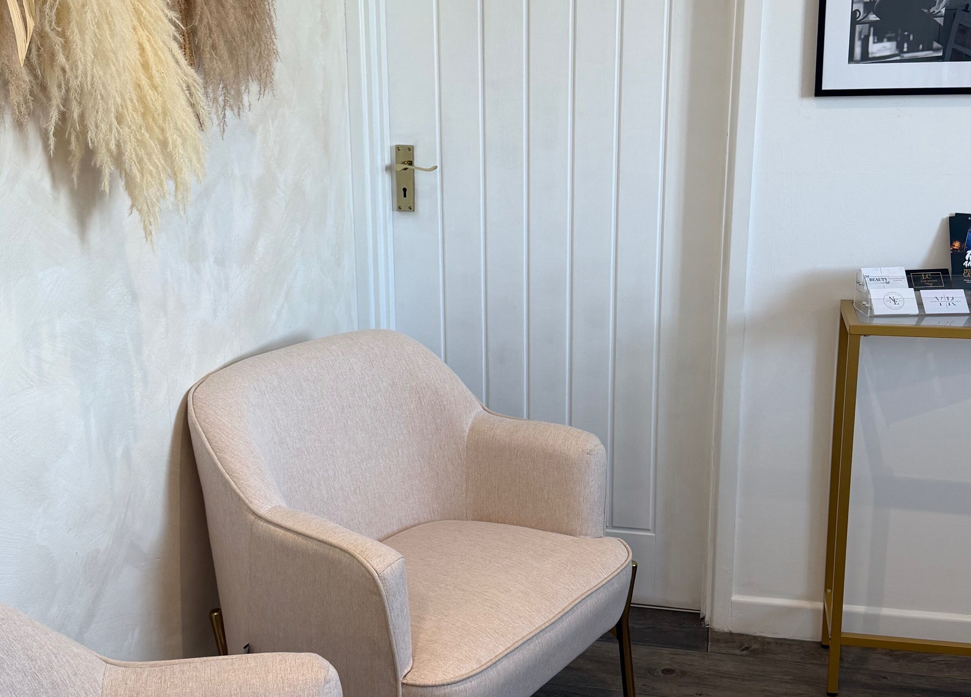 Inviting seating area at Reve Wellness Clinic, Peterborough, England, GB. Elegant chairs and decor create a warm ambiance.