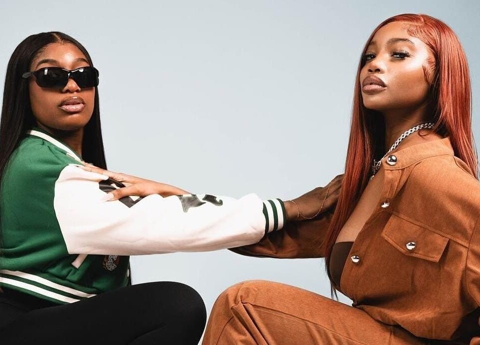 Stylish duo displaying modern hair trends at Badhaircentral, Cape Town, Western Cape, ZA.