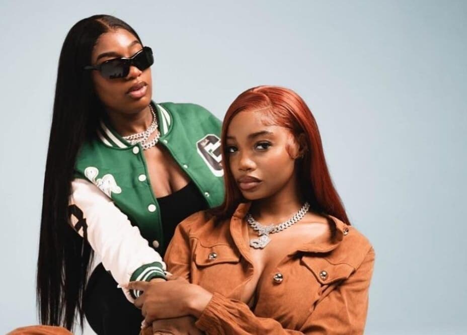 Two stylish women showcasing fashion at Badhaircentral, Cape Town, Western Cape, ZA.