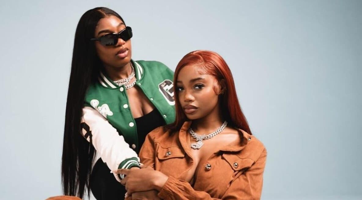 Two stylish women showcasing fashion at Badhaircentral, Cape Town, Western Cape, ZA.