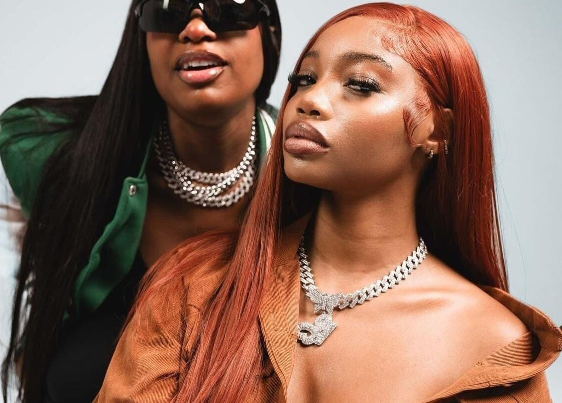 Stylish duo showcasing jewelry and hairstyles at Badhaircentral, Cape Town, Western Cape, ZA.