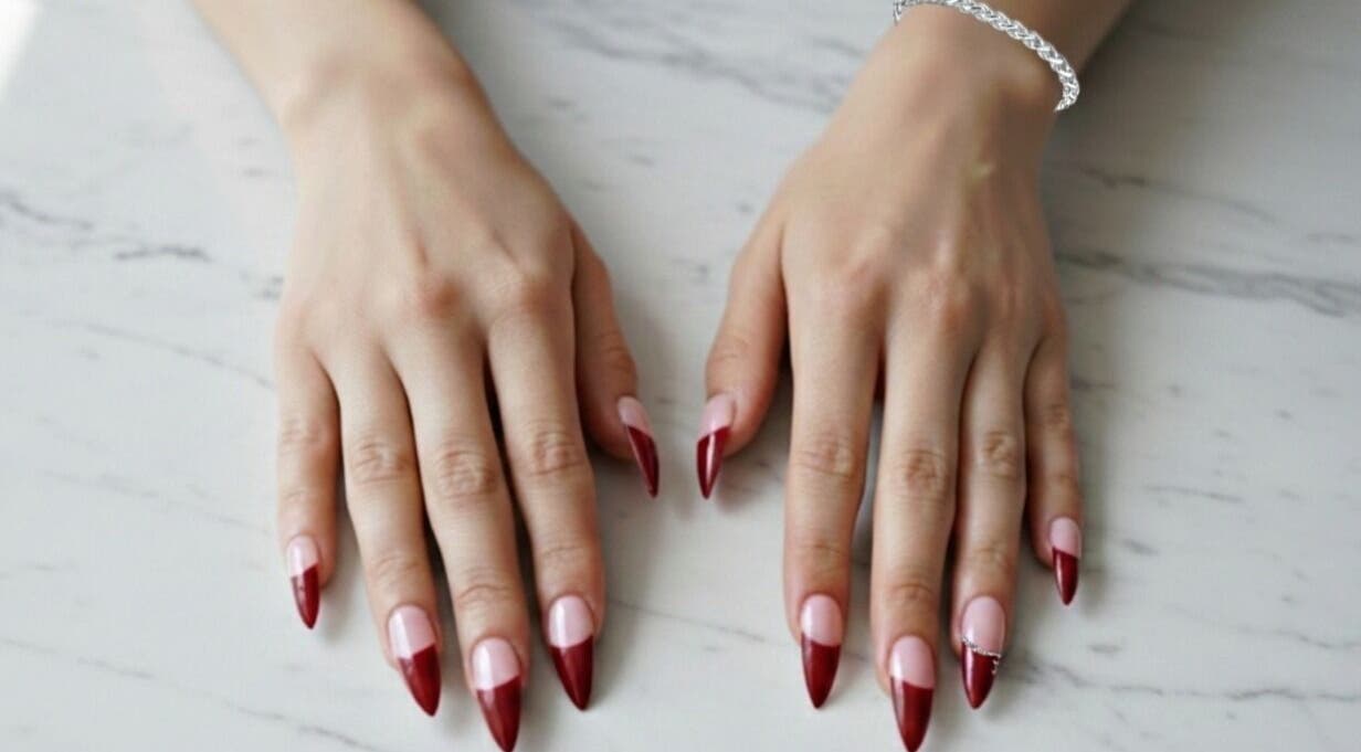 Stunning red-tipped nails at The Cherry Crimson Studio, Germiston, Gauteng, ZA, displaying elegance.