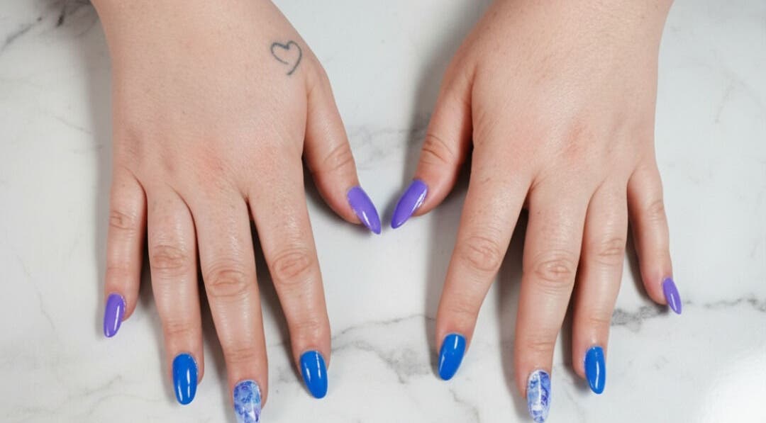 Bright purple and blue nail art at The Cherry Crimson Studio, Germiston, Gauteng, ZA.