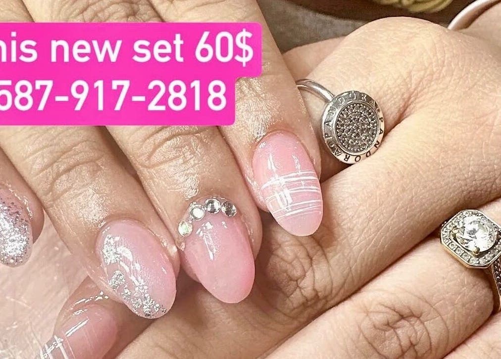 Elegant, glittery nail set by Nails By Hannah Le, Calgary, Alberta, CA. Features intricate designs and jewels.