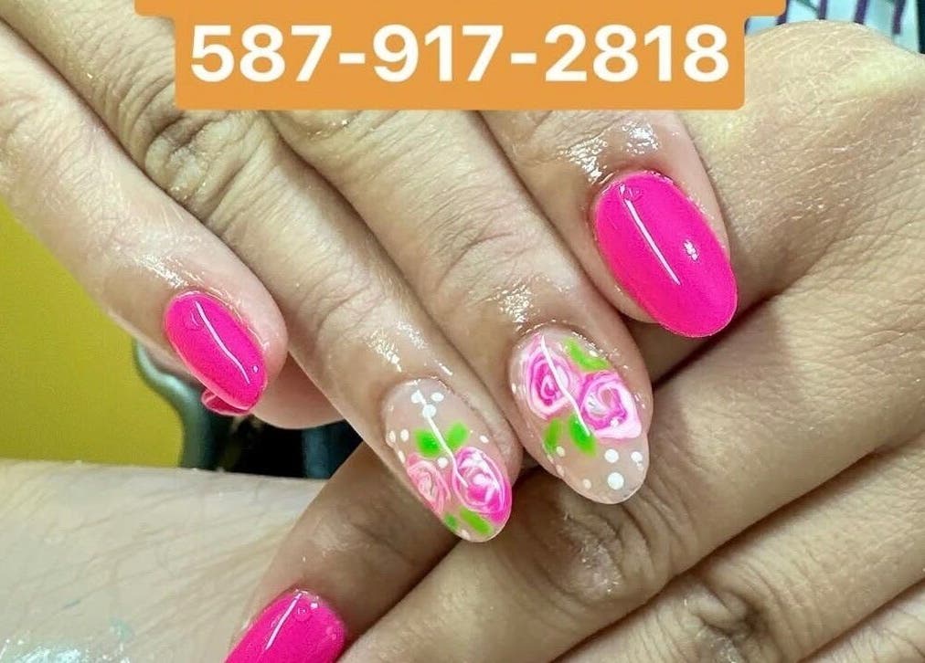Bright floral nail art from Nails By Hannah Le, Calgary, Alberta, CA. Stunning pink and flower designs.