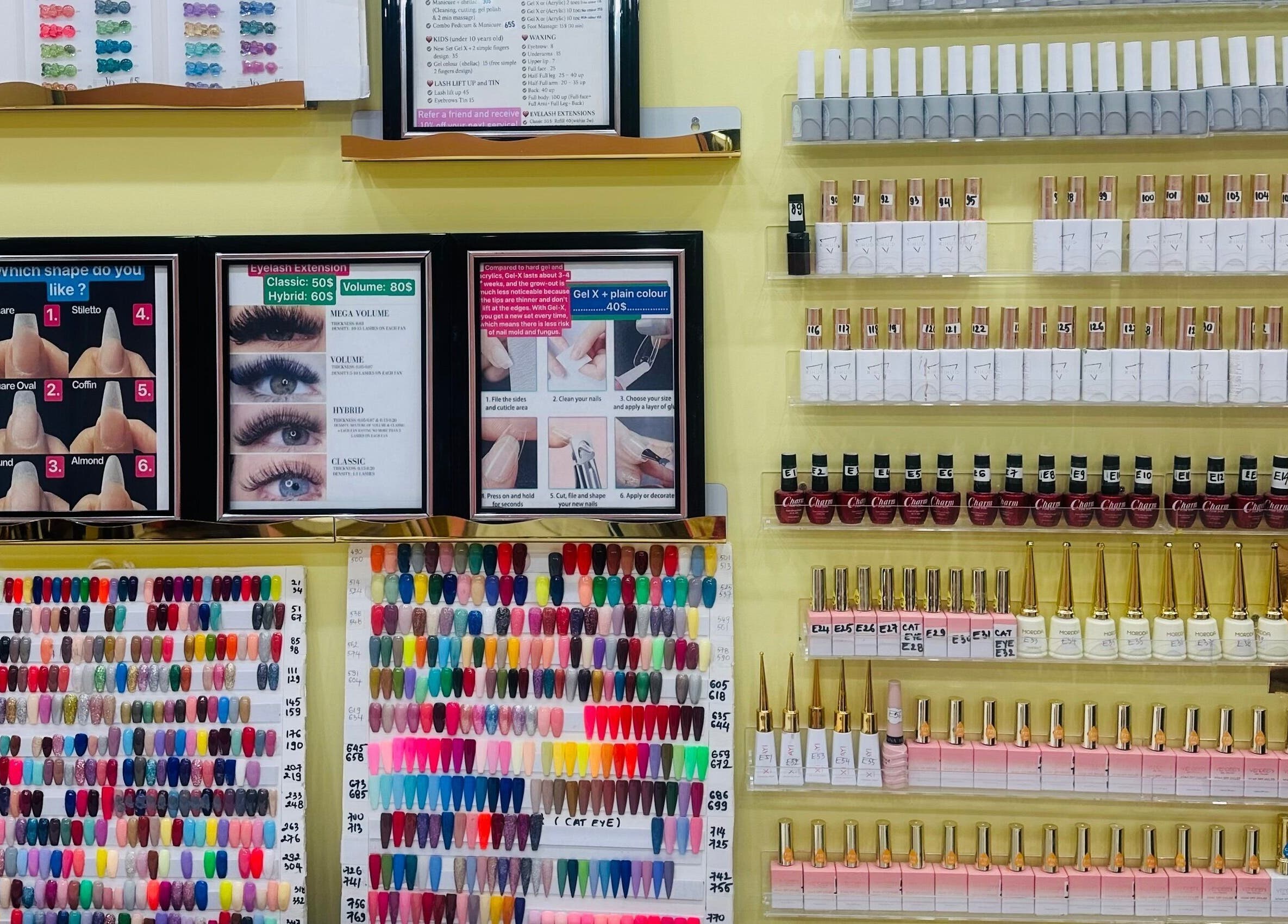 Vibrant nail polish display at Nails By Hannah Le, Calgary, Alberta, CA showcasing diverse nail options.