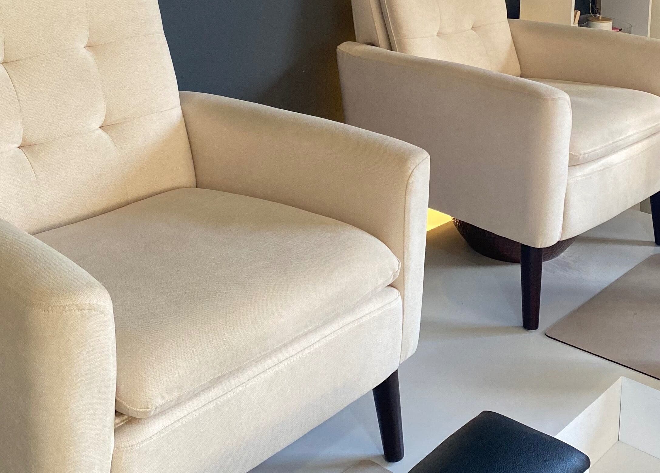Luxurious beige chairs at Ana's Nails Studio in Paramaribo, SR ensure comfort during nail treatments.