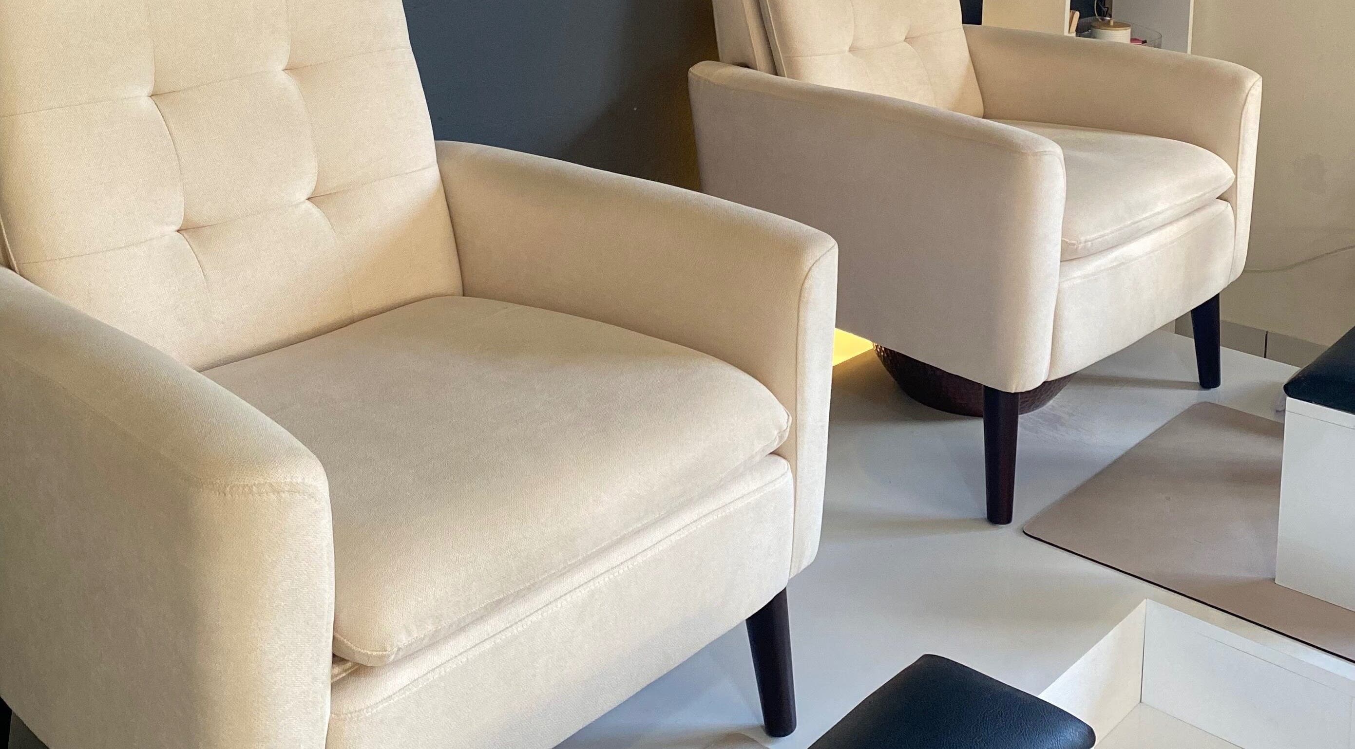 Luxurious beige chairs at Ana's Nails Studio in Paramaribo, SR ensure comfort during nail treatments.