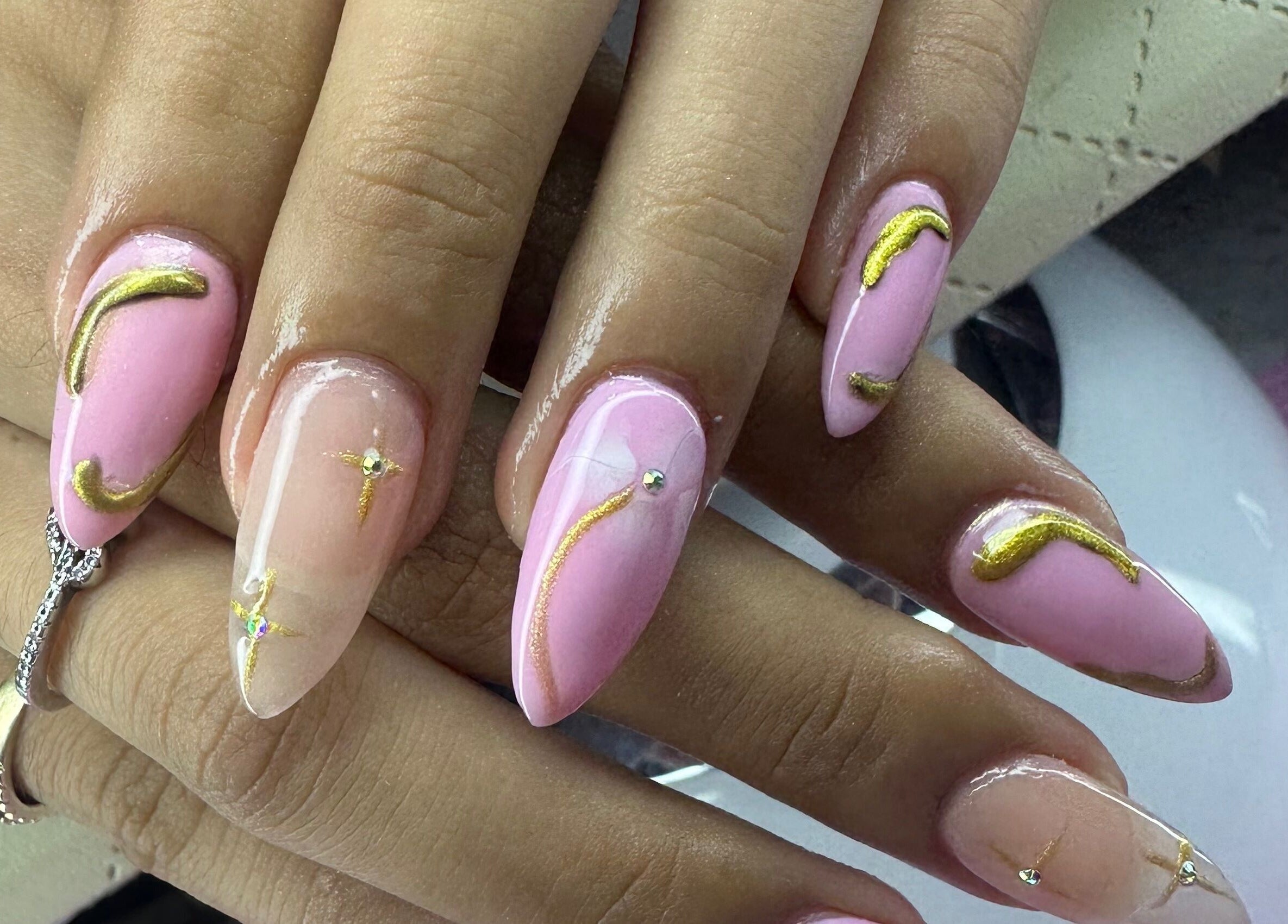 Elegant pink and gold nail art at Aleya's Infinite Glow, Paramaribo, Paramaribo, SR.