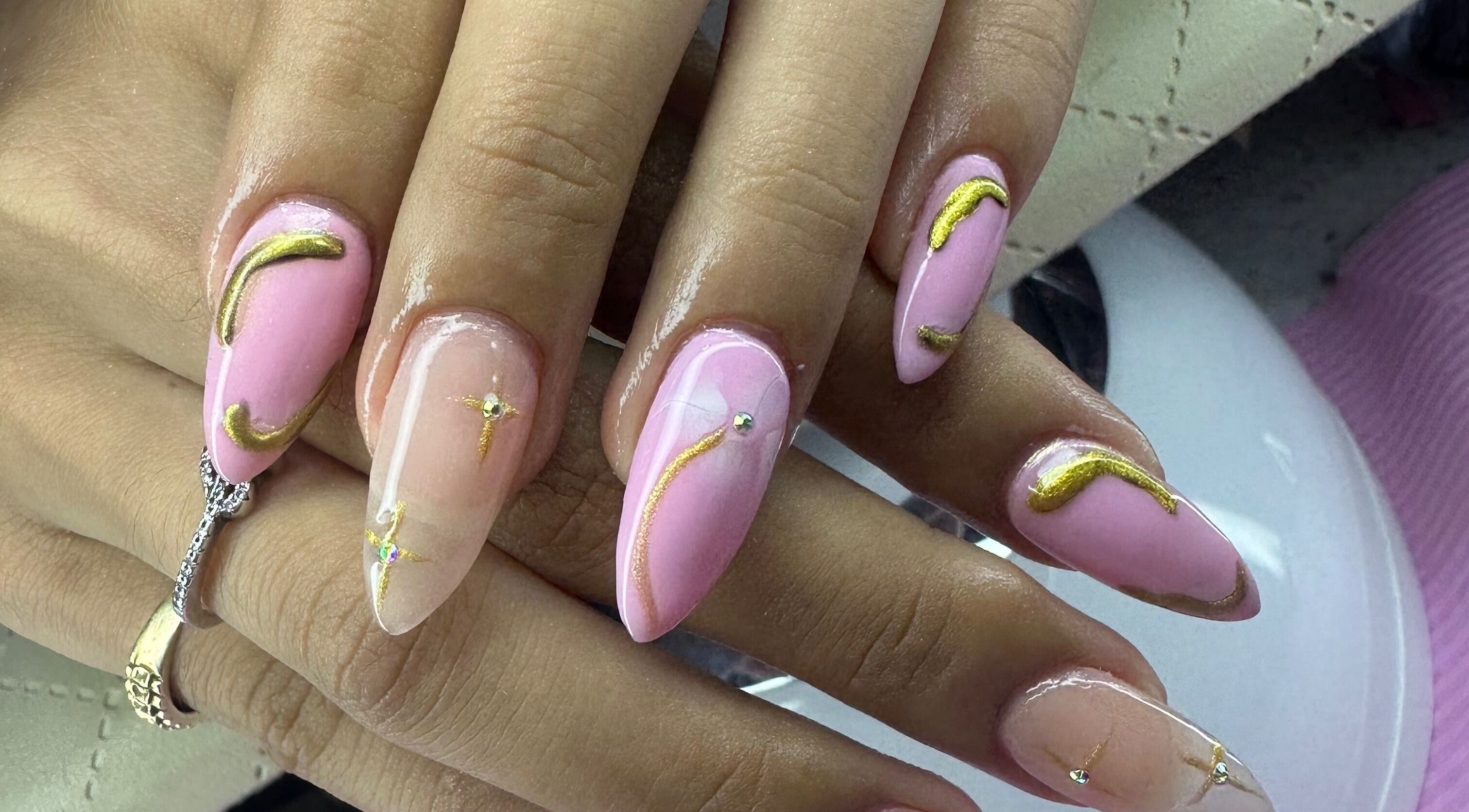 Elegant pink and gold nail art at Aleya's Infinite Glow, Paramaribo, Paramaribo, SR.