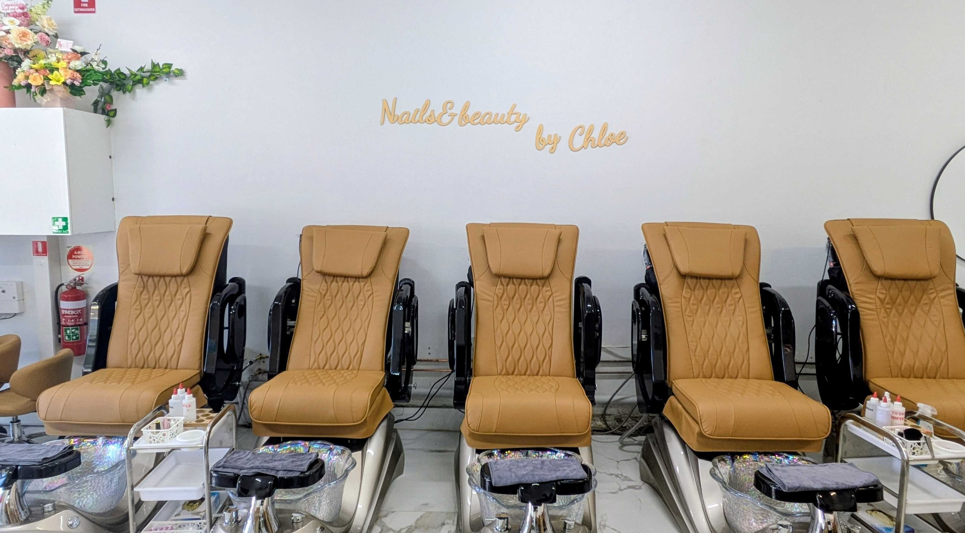 Luxurious pedicure chairs at Nails & Beauty By Chloe in Merrylands, AU, offering premium nail services.
