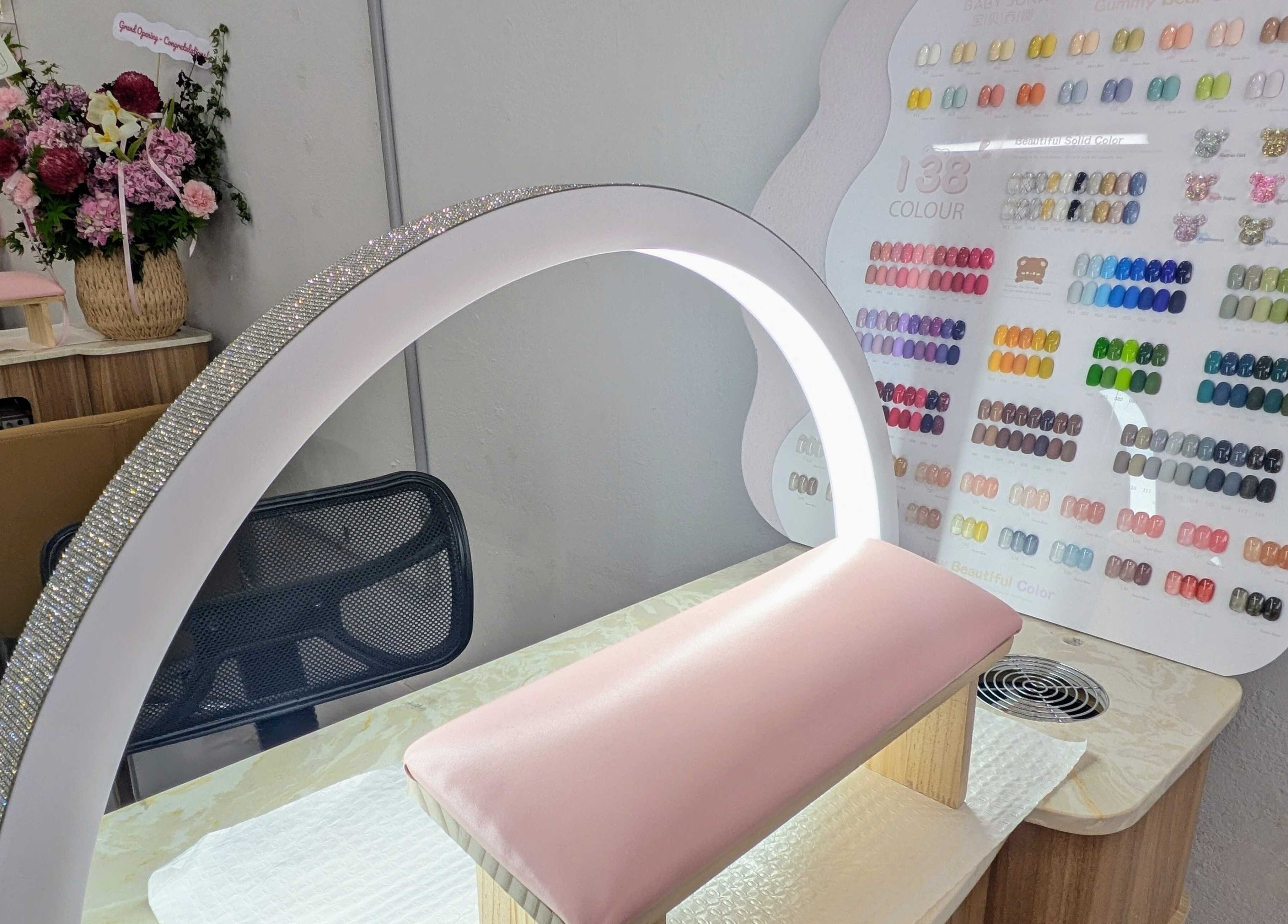 Nail station at Nails & Beauty By Chloe in Merrylands, AU showcasing a vibrant nail polish selection.