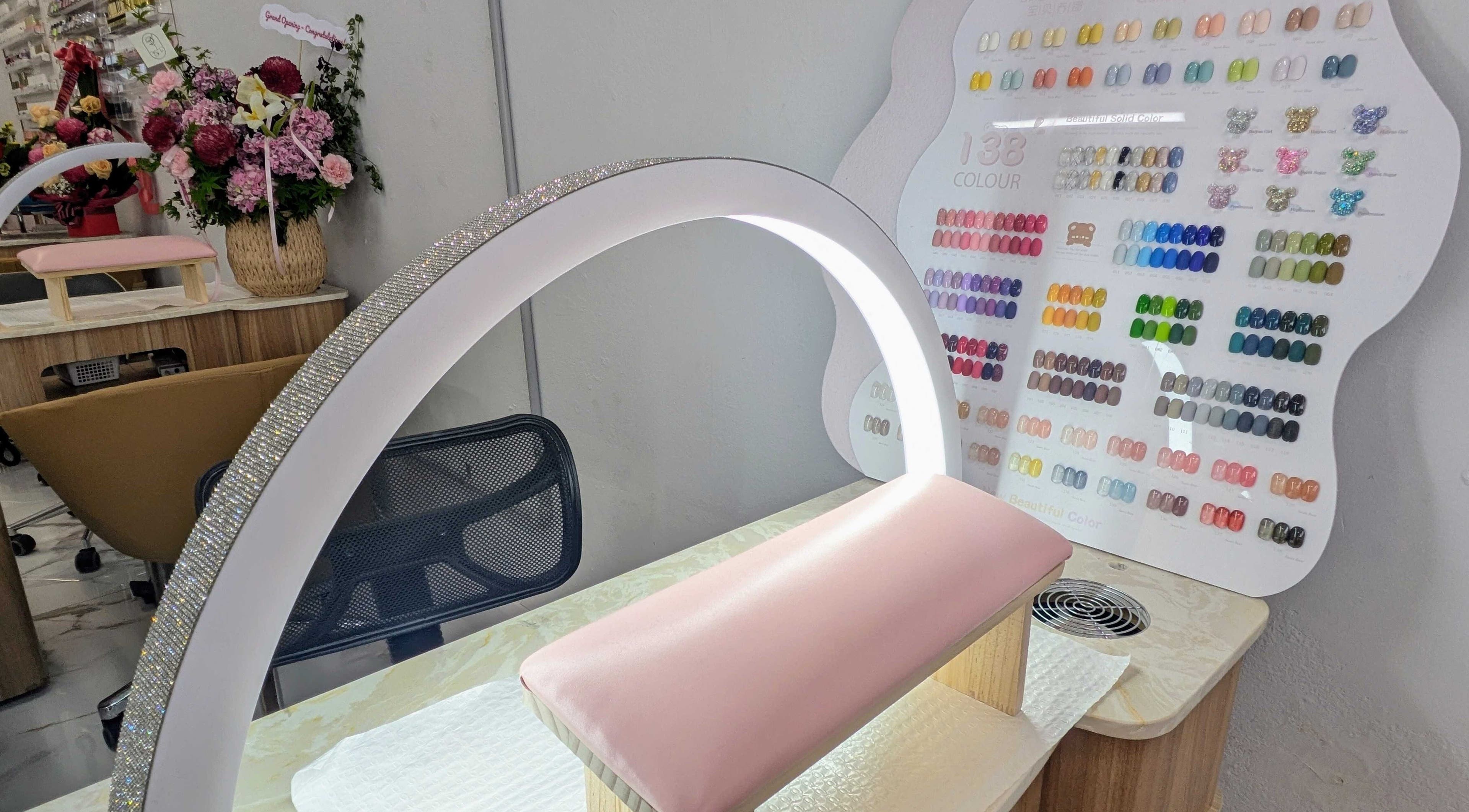 Nail station at Nails & Beauty By Chloe in Merrylands, AU showcasing a vibrant nail polish selection.