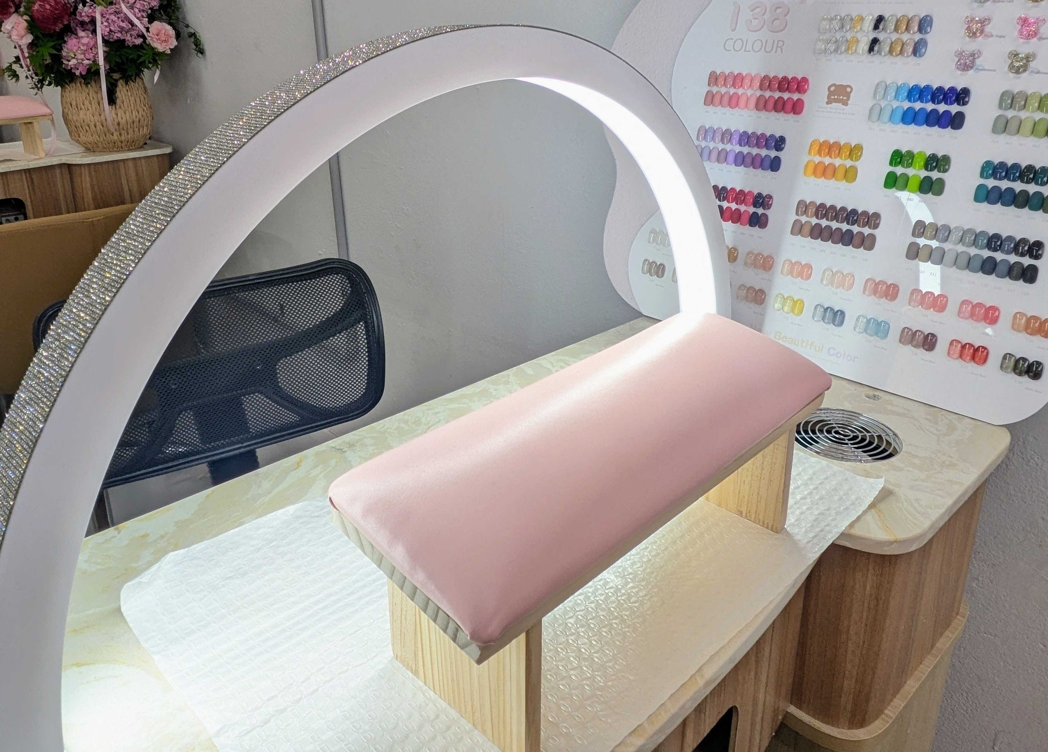 Elegant manicure station at Nails & Beauty By Chloe, Merrylands, New South Wales, AU with vibrant nail colors displayed.