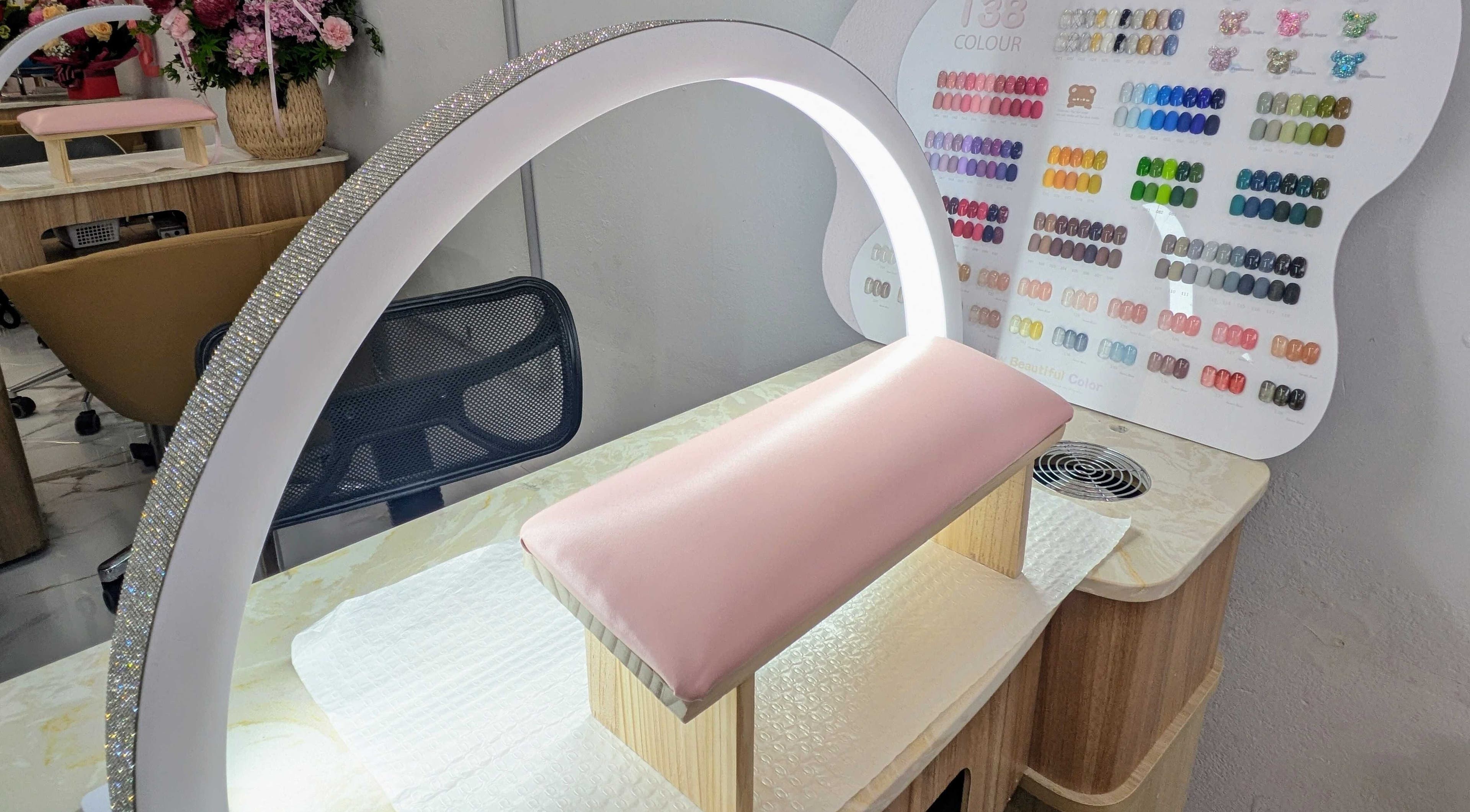 Elegant manicure station at Nails & Beauty By Chloe, Merrylands, New South Wales, AU with vibrant nail colors displayed.