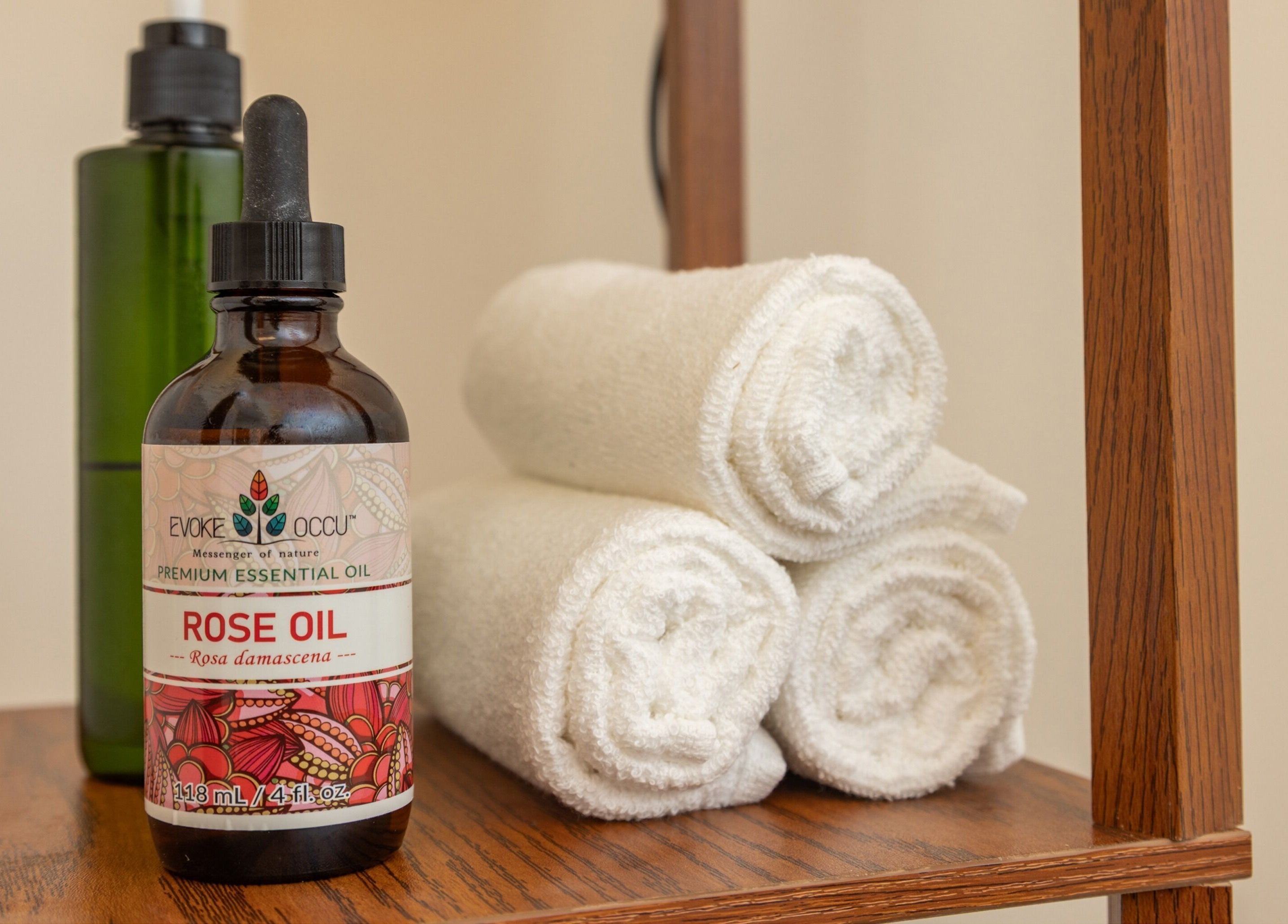 Rose oil and plush towels at Institut NewYou in Sainte-Anne-de-Bellevue, Québec, CA offer a soothing experience.
