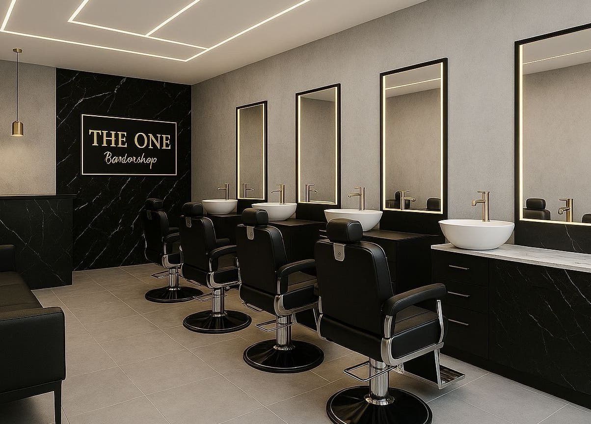 Elegant barber chairs at THE BARBER ONE, San Andrés Cholula, Puebla, MX. Modern grooming interior.