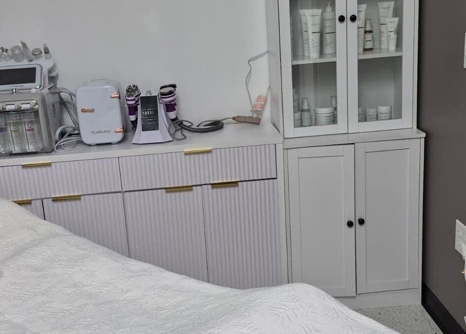 Treatment room at Dubai Lux Spa in Barnstable, Massachusetts featuring modern skincare equipment.