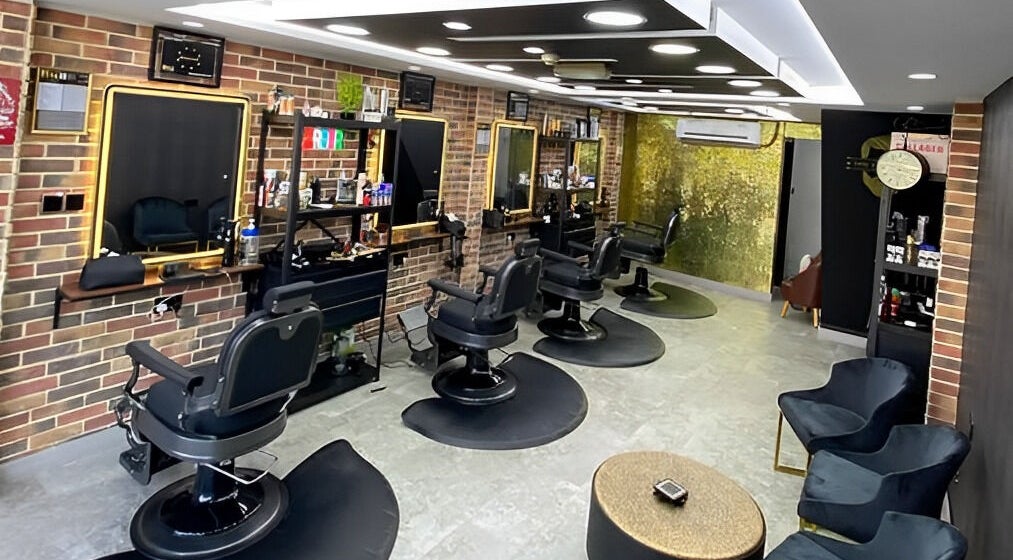 Modern interior of Best Cuts Gents Salon in Dubai, Dubai, AE showcasing sleek barber chairs and stylish decor.