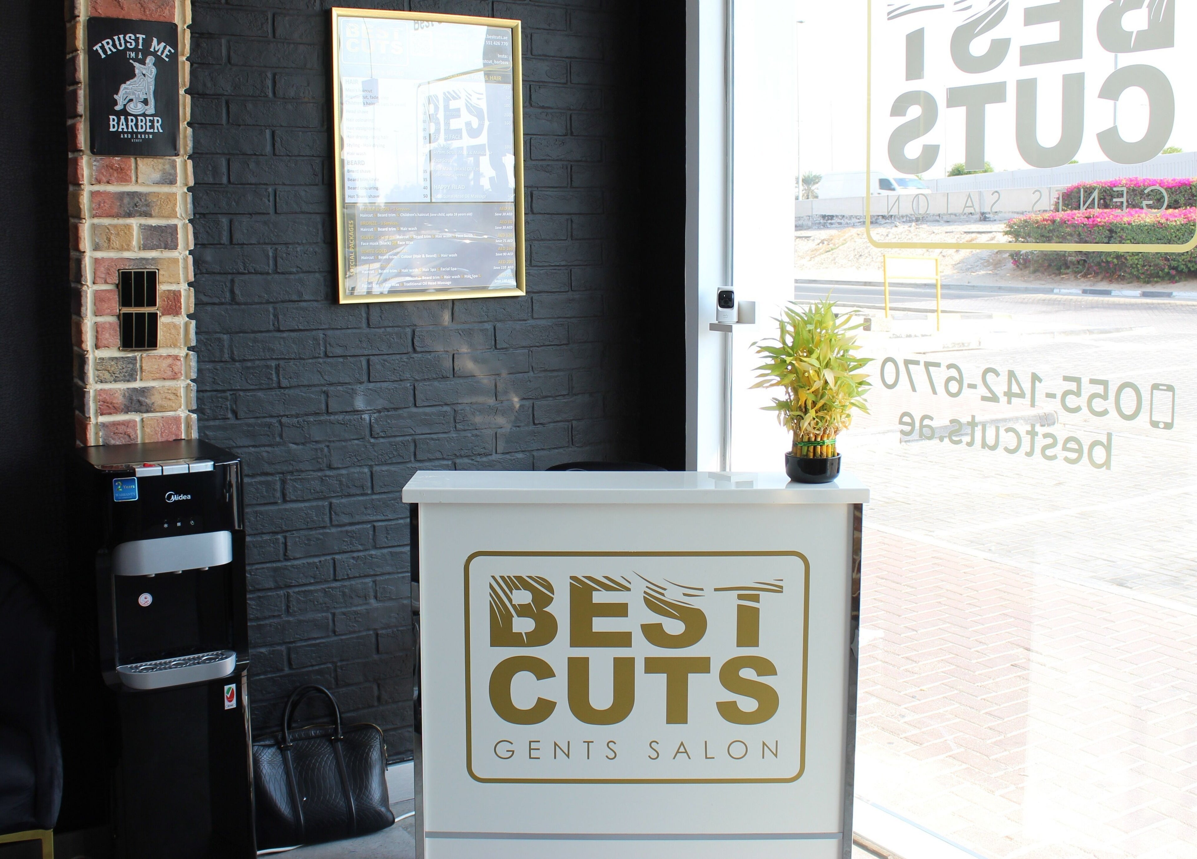 Reception area of Best Cuts Gents Salon in Dubai, Dubai, AE with stylish decor and natural light.