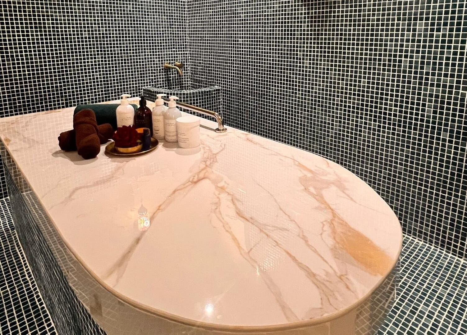 Luxurious marble spa table at Spa Jelita Malaysia, Kuala Lumpur for rejuvenating treatments.