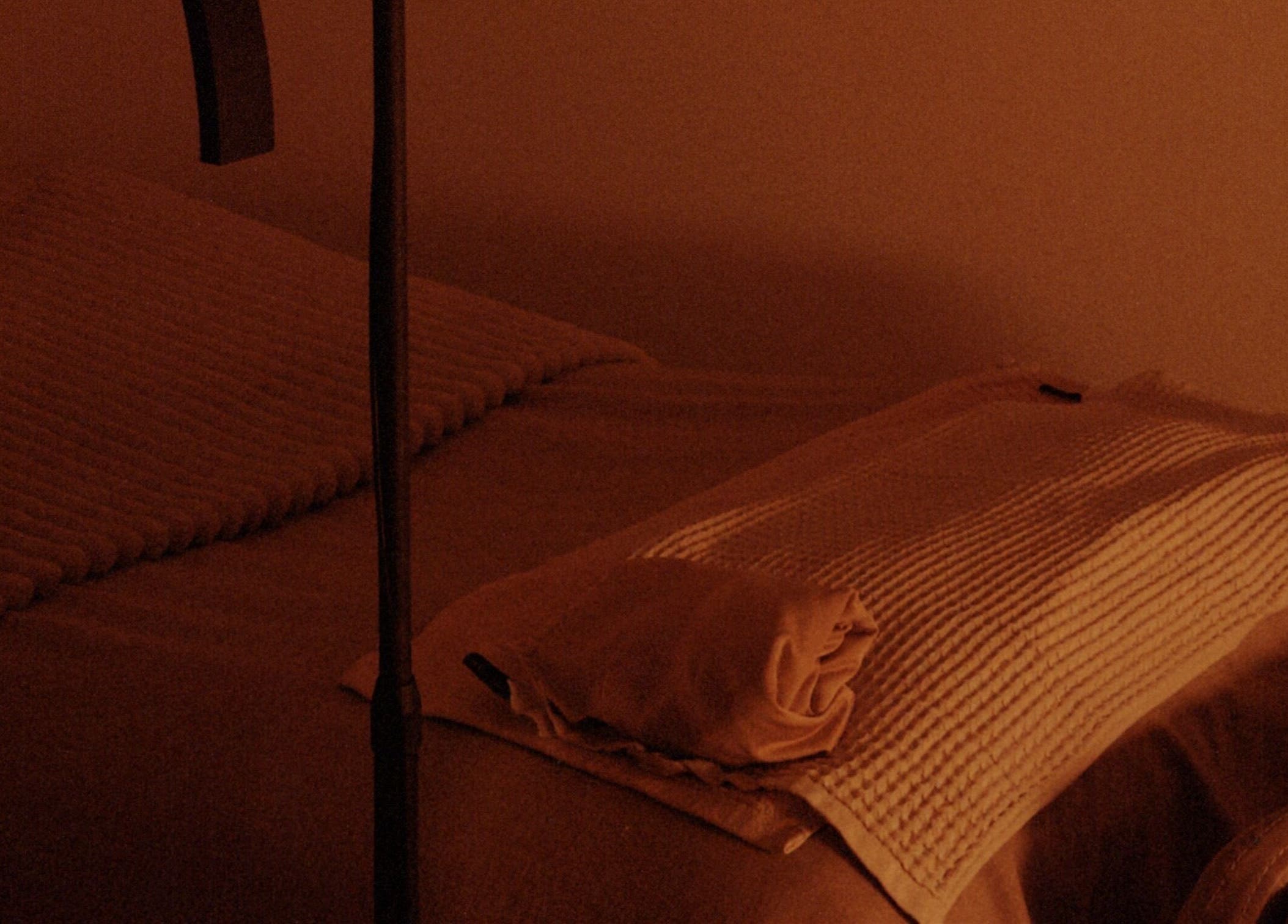 Cozy spa bed with warm lighting at Noamskin, Kuala Lumpur, Wilayah Persekutuan Kuala Lumpur, MY.