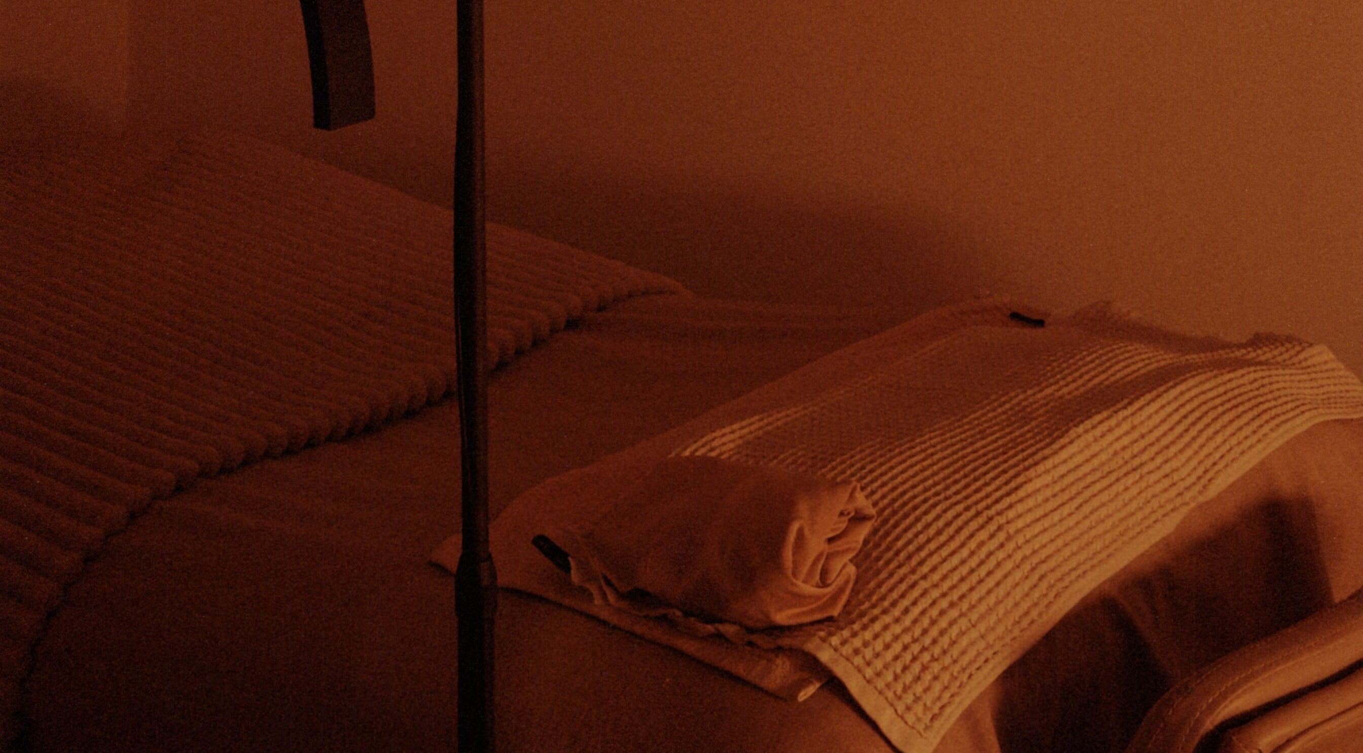 Cozy spa bed with warm lighting at Noamskin, Kuala Lumpur, Wilayah Persekutuan Kuala Lumpur, MY.