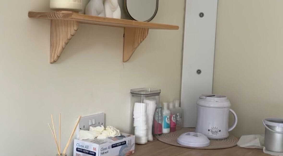 Tranquil skincare setup at Em Beauty Care in Airdrie, Scotland, GB with essential oils and treatment tools.