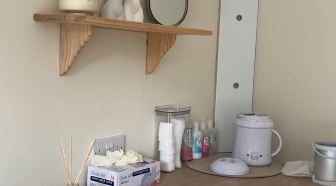 Tranquil skincare setup at Em Beauty Care in Airdrie, Scotland, GB with essential oils and treatment tools.