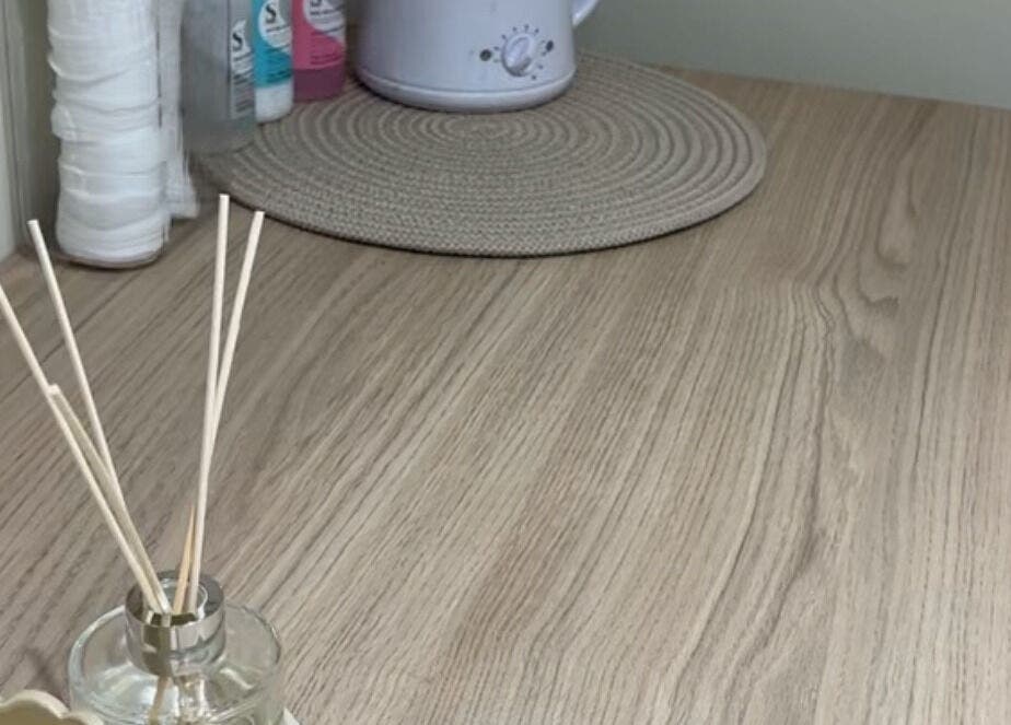 Peaceful spa setup with diffuser at Em Beauty Care in Airdrie, Scotland, GB for a calming experience.