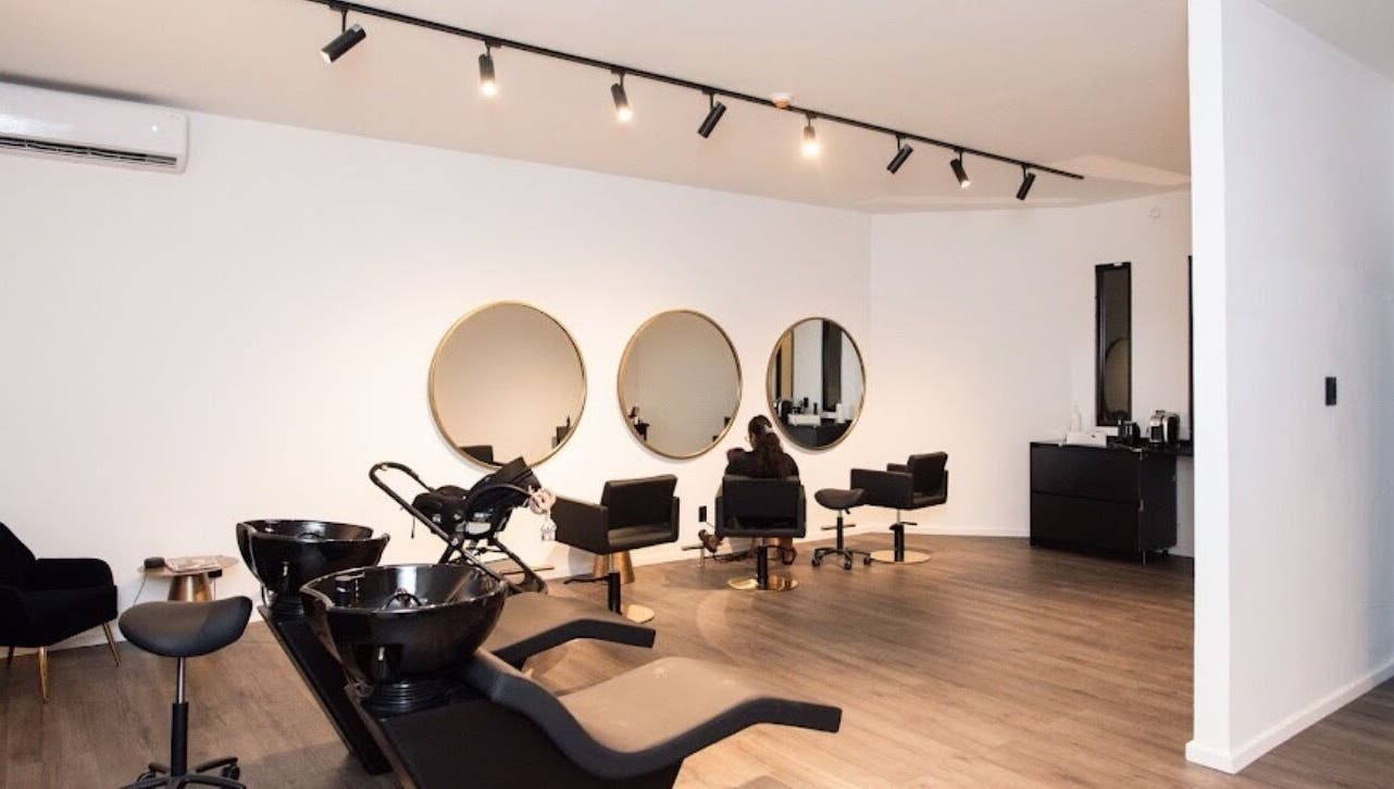 Interior of Delete Beauty Lounge with sleek salon chairs in Paramaribo, Paramaribo, SR.