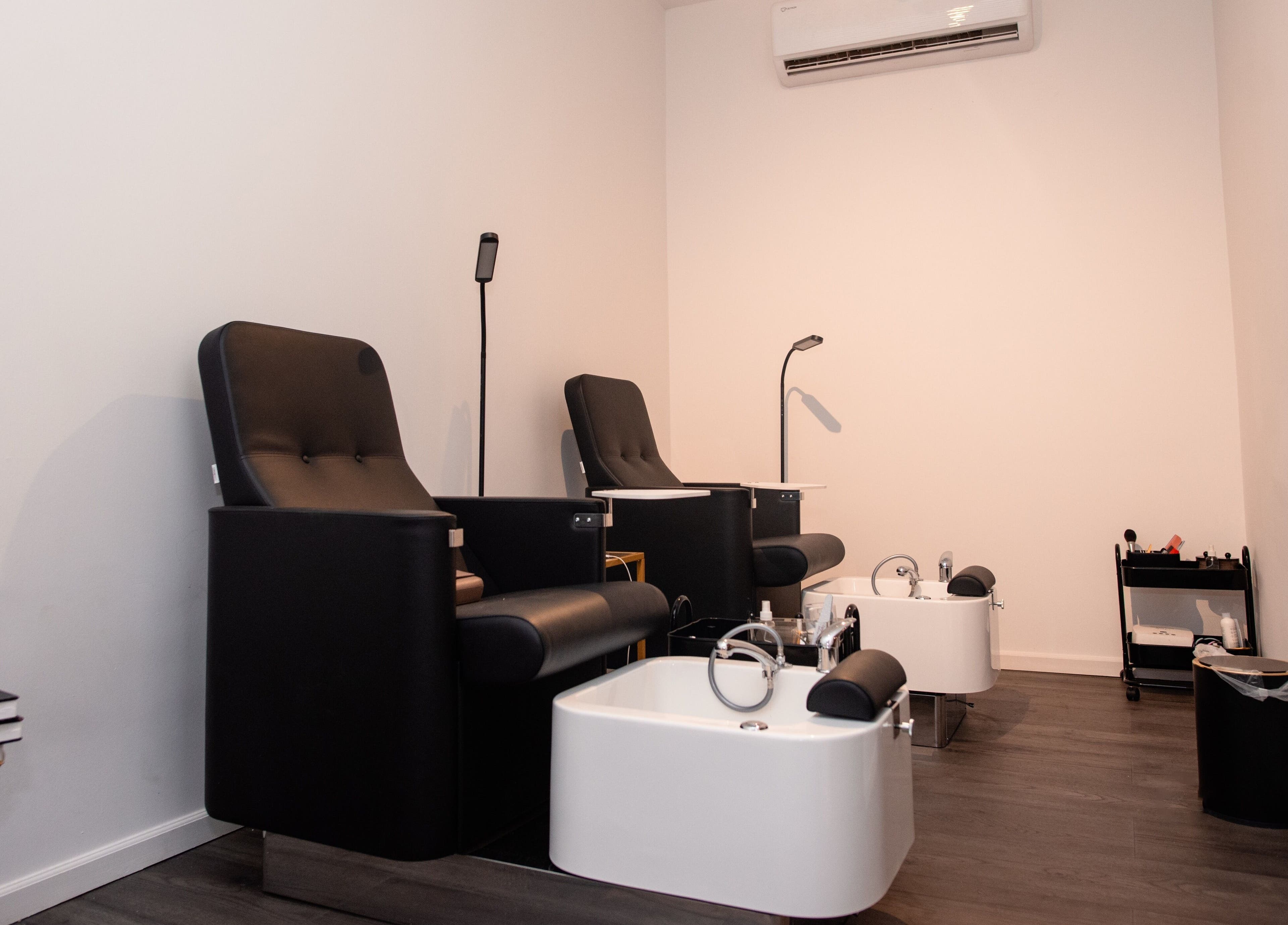 Luxurious pedicure stations at Delete Beauty Lounge in Paramaribo, Paramaribo, SR for ultimate relaxation.