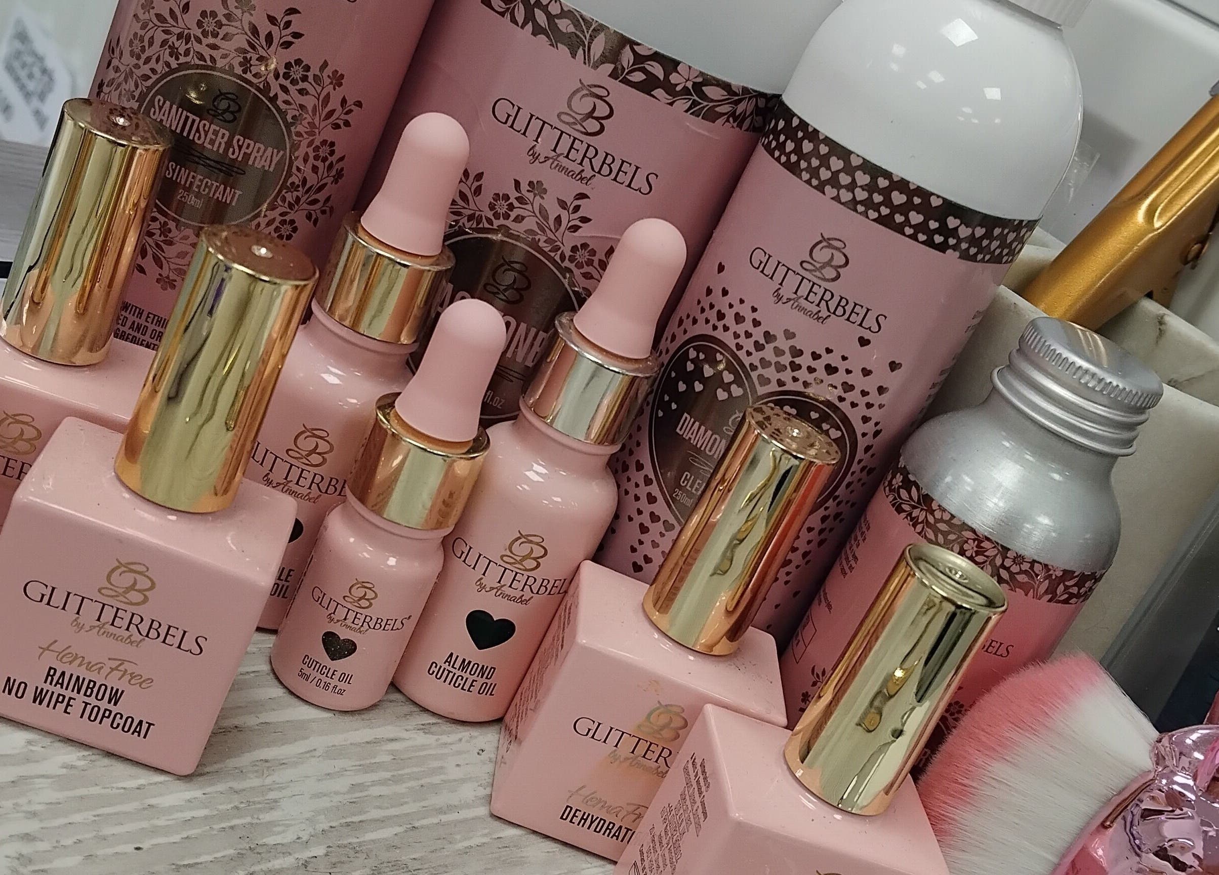 Nail care products at Nails by Tay, Newcastle-under-lyme, England, GB featuring Glitterbels bottles.
