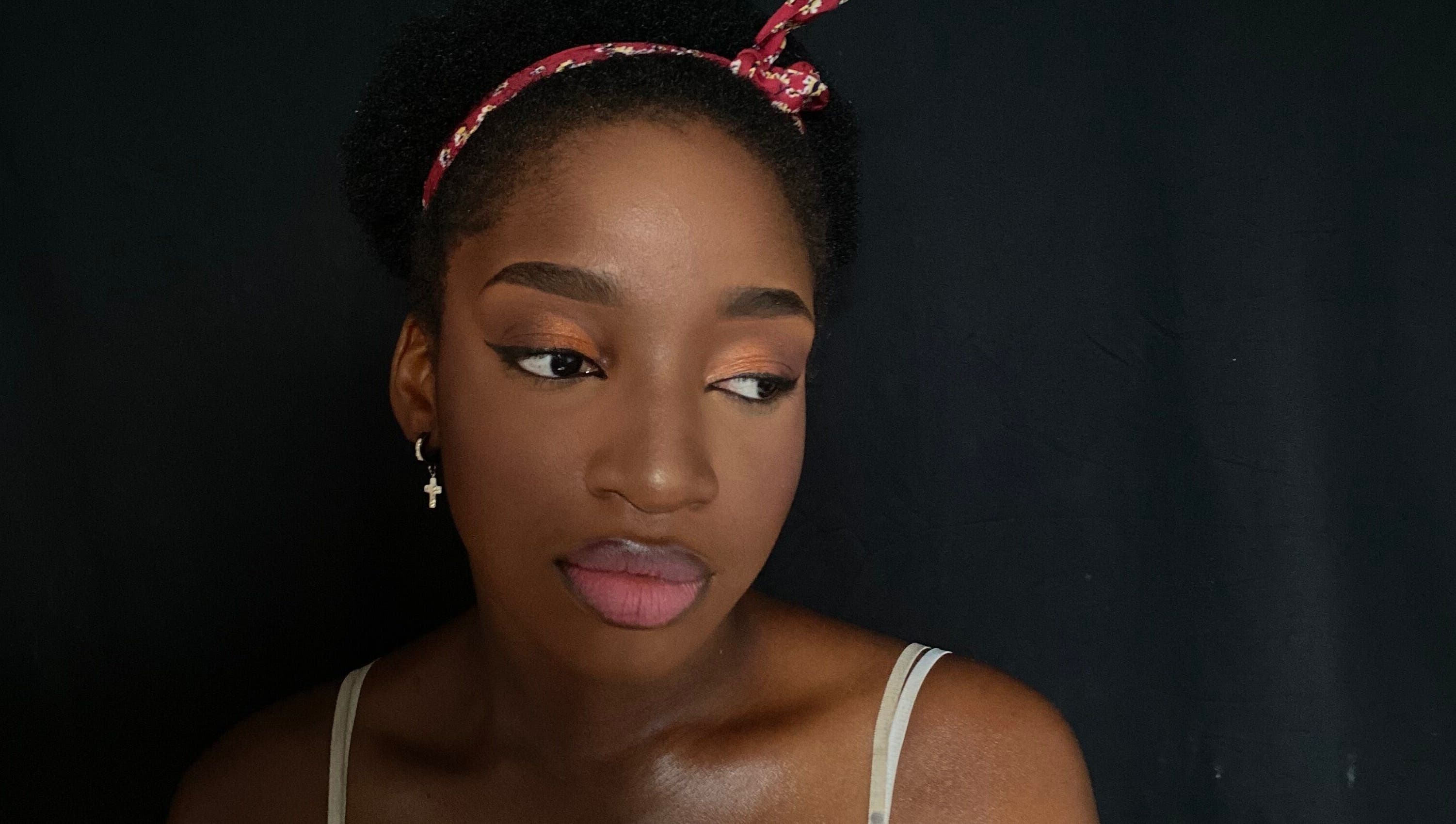 Close-up of a woman's face with elegant makeup at Beatsbyzara, Lagos, Lagos, NG.