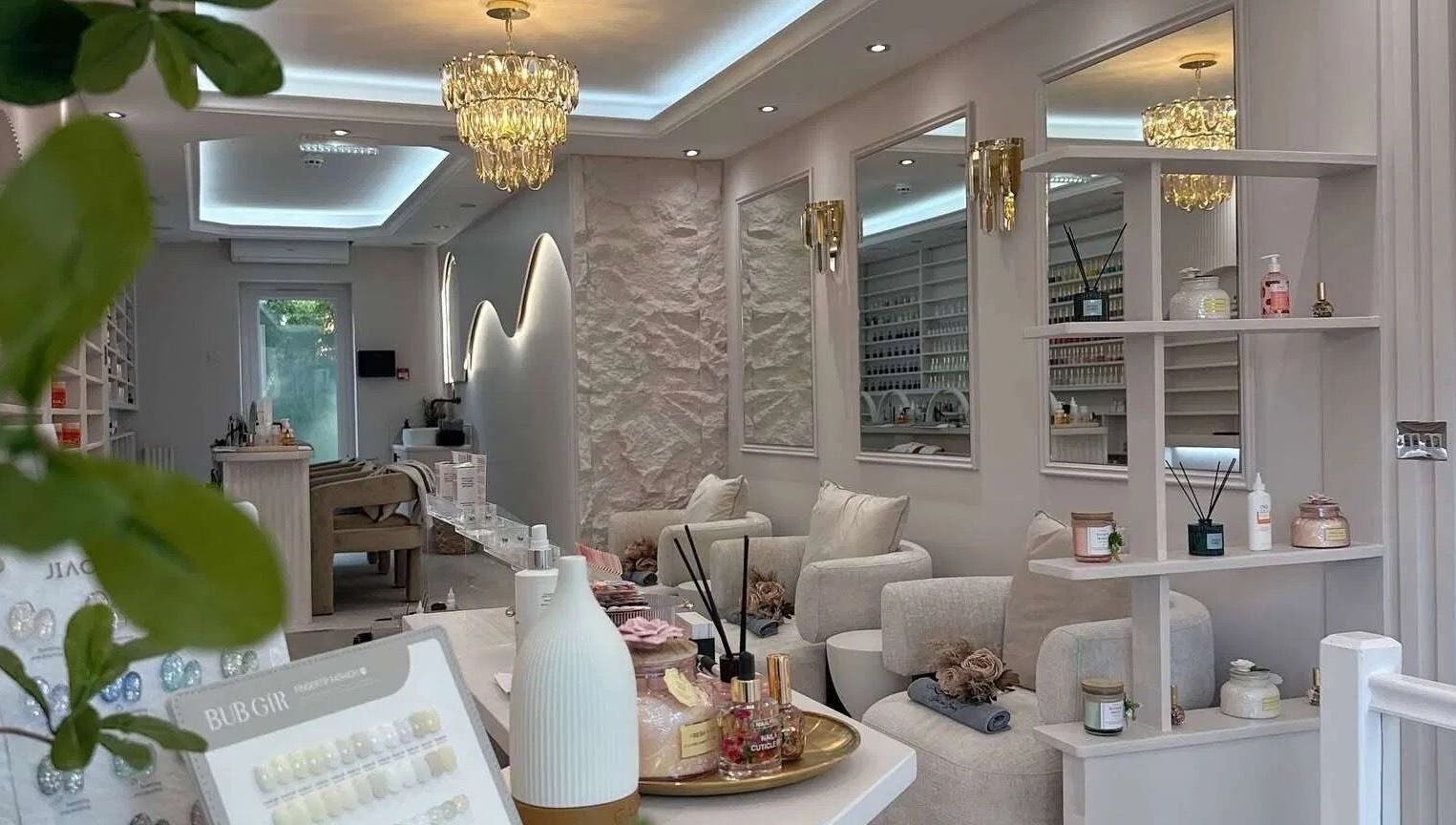 Elegant interior of By Amarni Tian in London, England, GB featuring plush seating and ambient lighting.