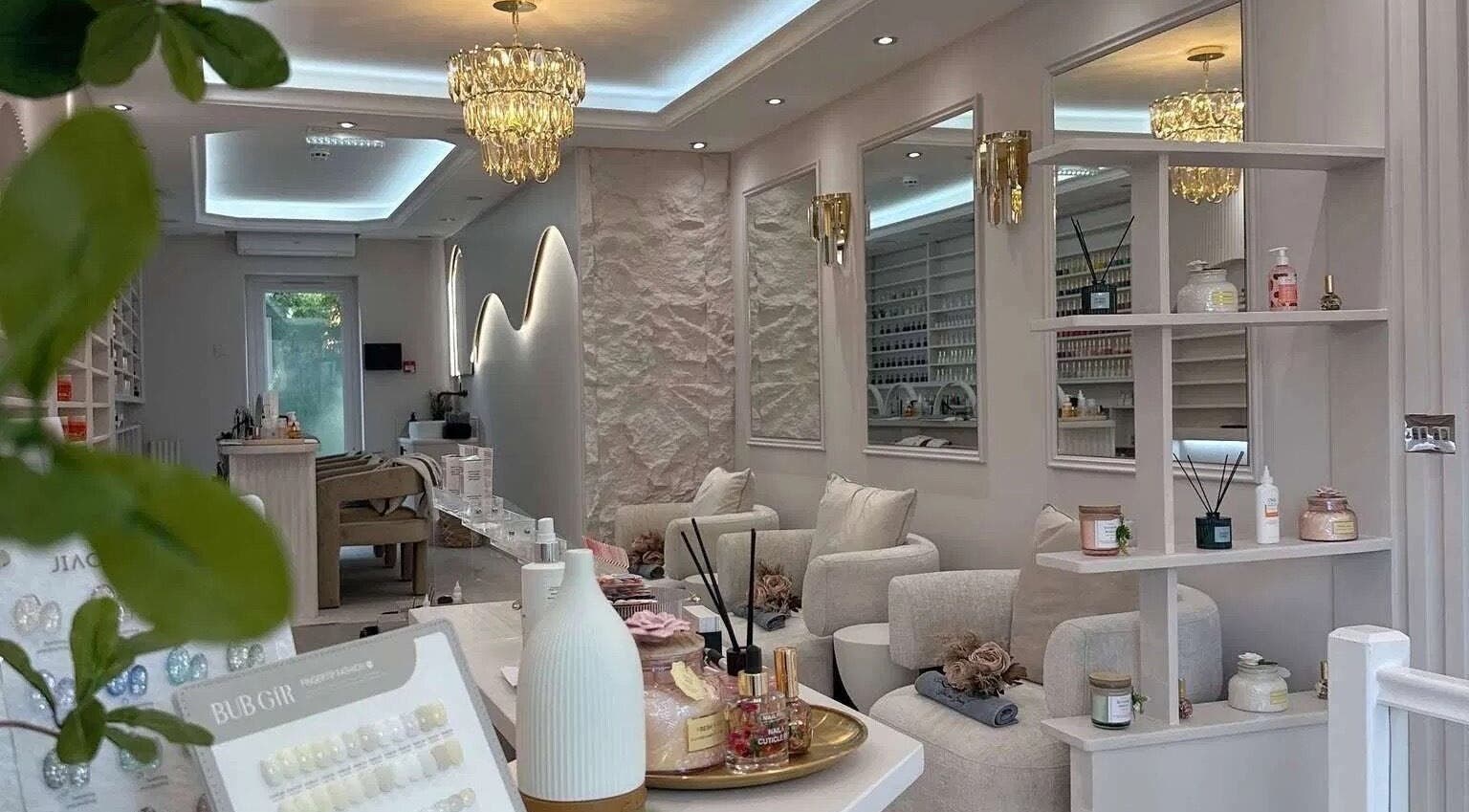 Elegant interior of By Amarni Tian in London, England, GB featuring plush seating and ambient lighting.