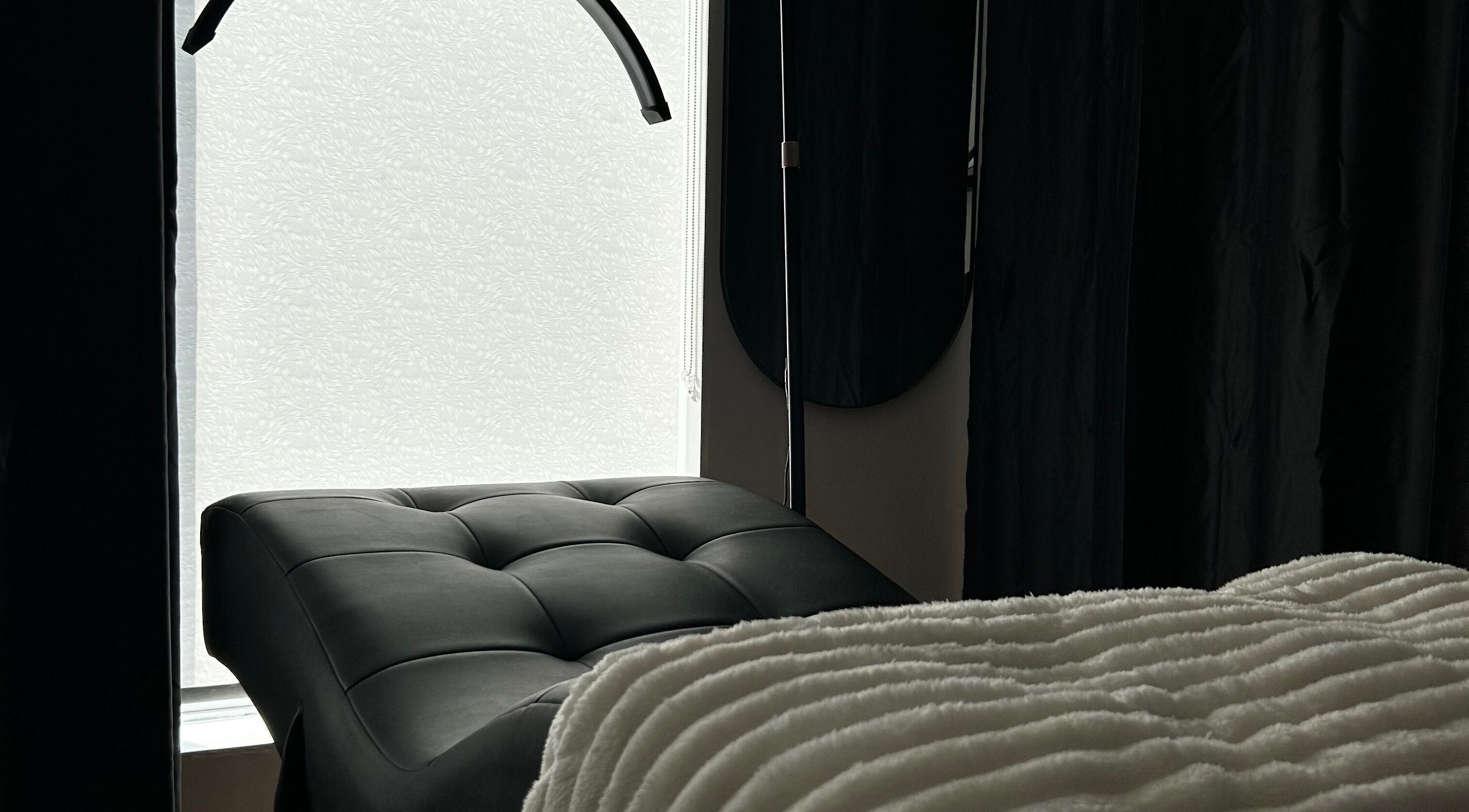 Luxurious spa bed at Aesthetics By Abbey in Gatineau, Québec, CA creating a tranquil atmosphere.