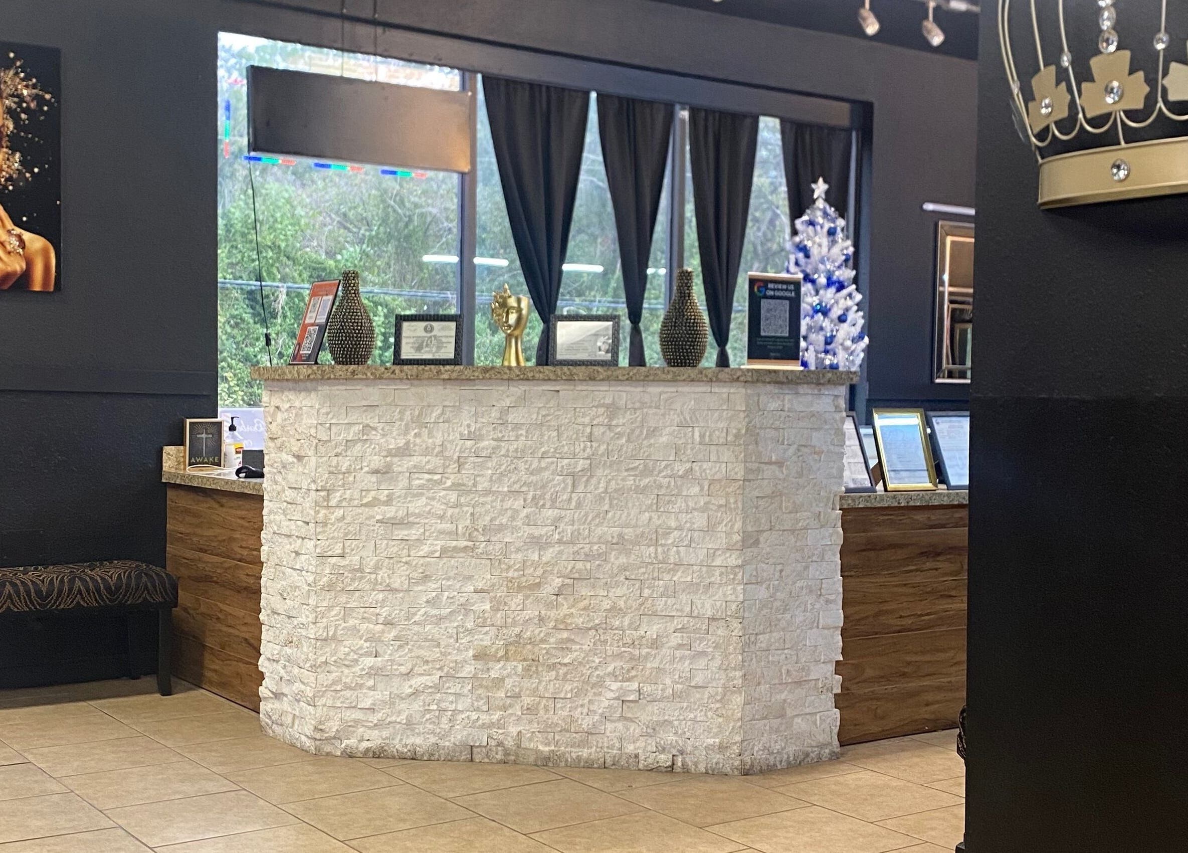 Inviting reception at BONE | BARBER + SMP, Spring, Texas, US, featuring modern decor and chic ambiance.