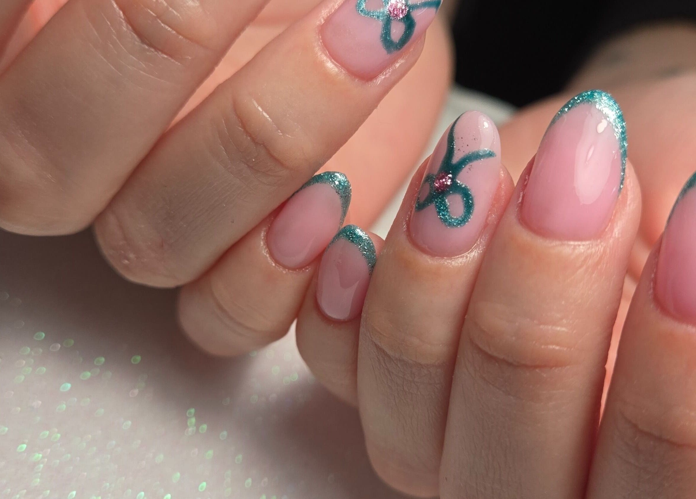 Close-up of stylish green nail art at Luana Alvarenga Nail Atelier, Lisboa, Lisboa, PT.