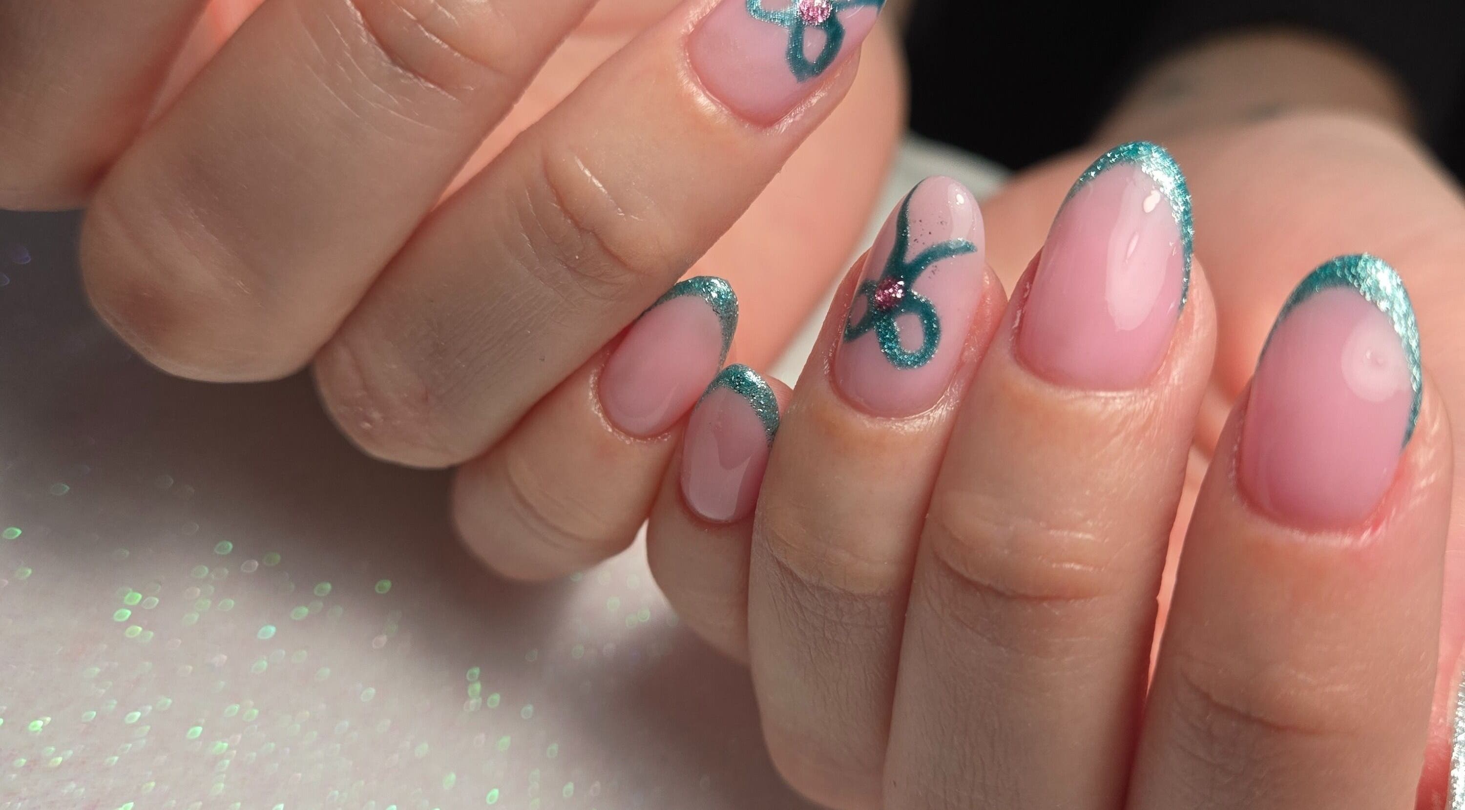 Close-up of stylish green nail art at Luana Alvarenga Nail Atelier, Lisboa, Lisboa, PT.