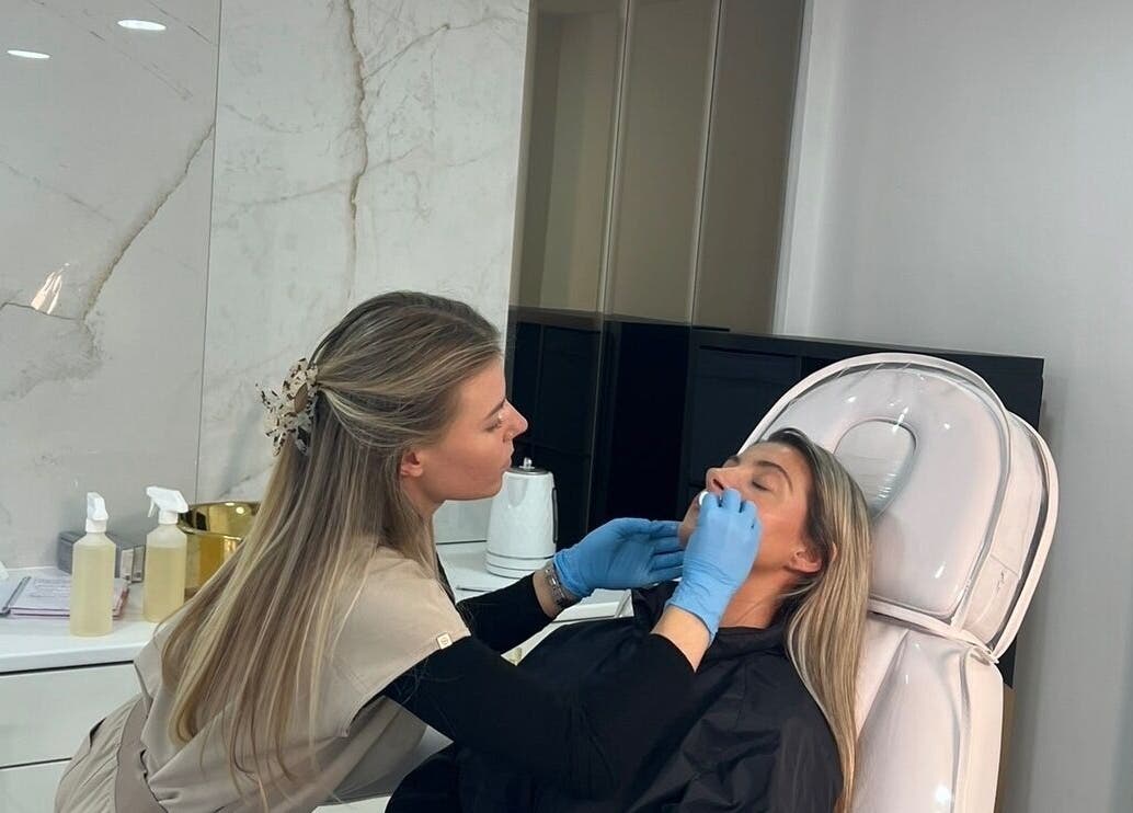 Professional facial treatment at Aura Skinn By Sandra, Buckhurst Hill, England, GB. A calm and elegant skincare session.