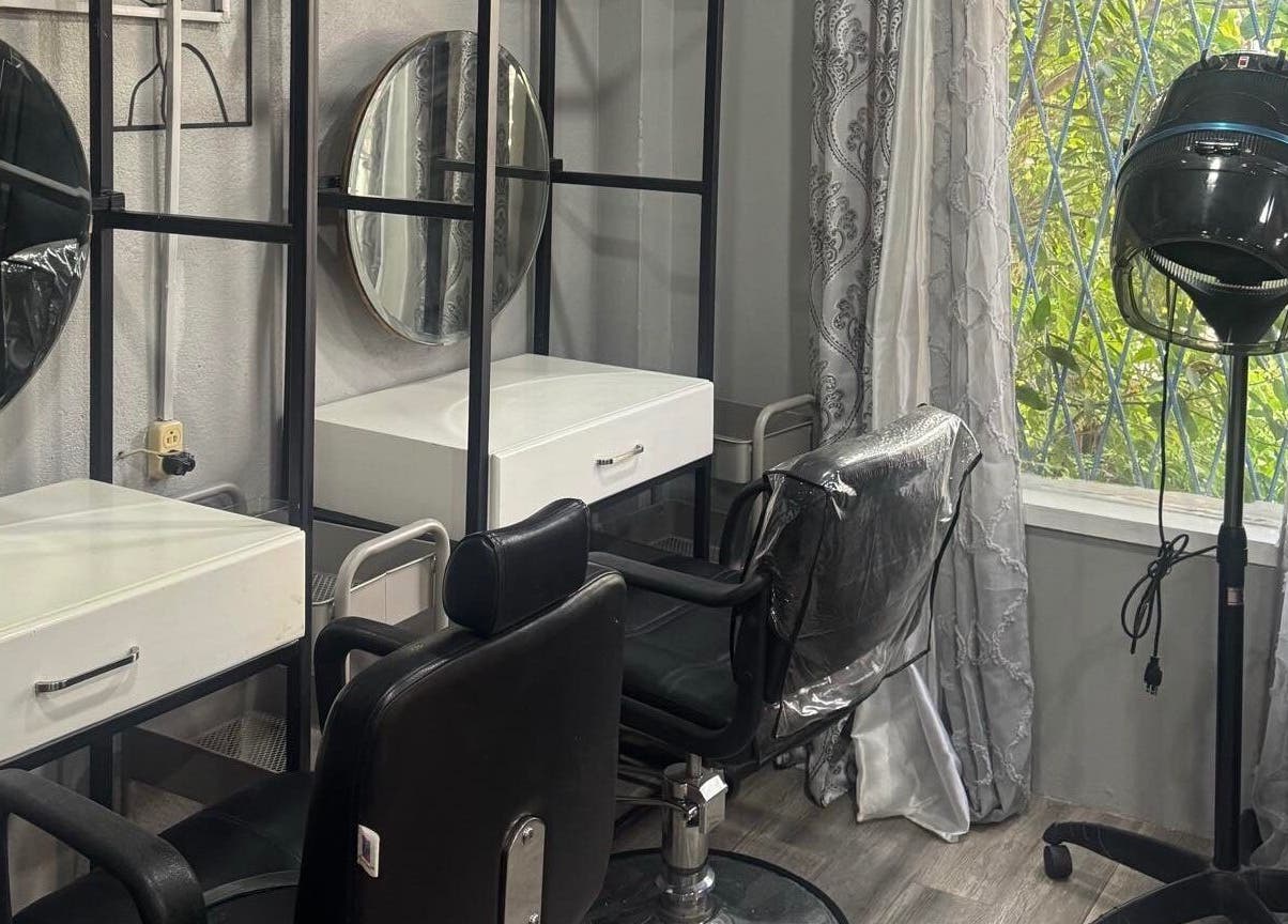 Modern styling chairs at Glam Looks Beauty Salon, Demerara-mahaica, GY, with elegant design.