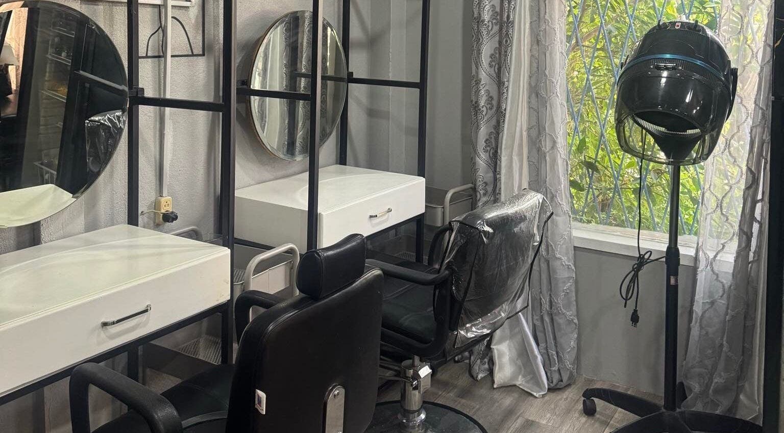 Modern styling chairs at Glam Looks Beauty Salon, Demerara-mahaica, GY, with elegant design.