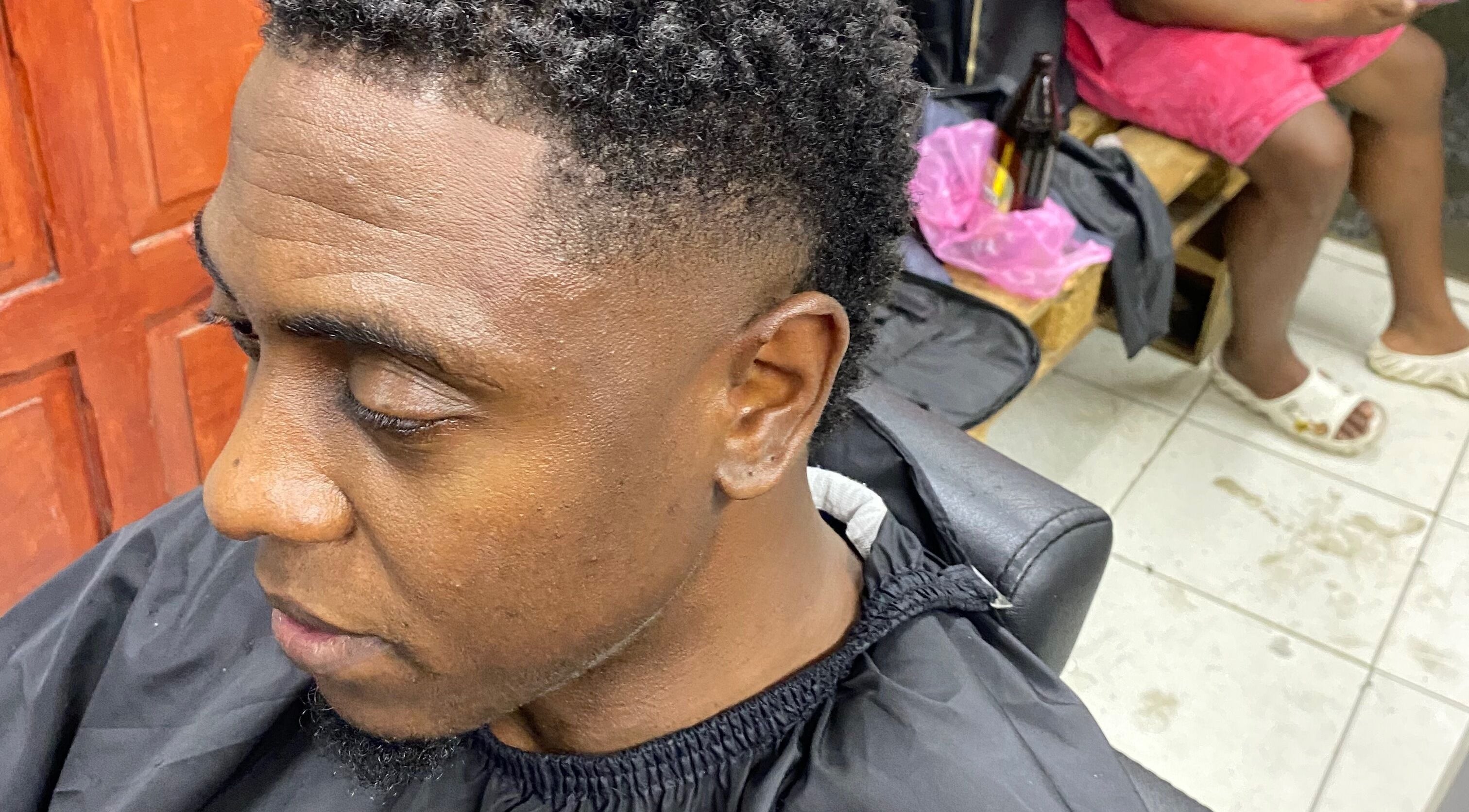 Close-up of a fresh fade haircut at Belly's Barbershop, Paramaribo, Paramaribo, SR. Expert barbering showcased.