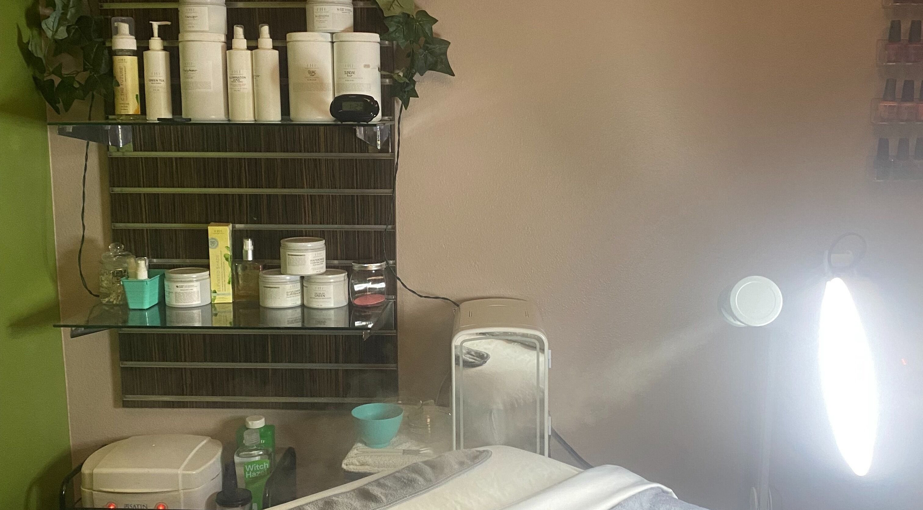 Skincare products and spa setup at Elevation Beauty Studios in Oshkosh, Wisconsin, US.