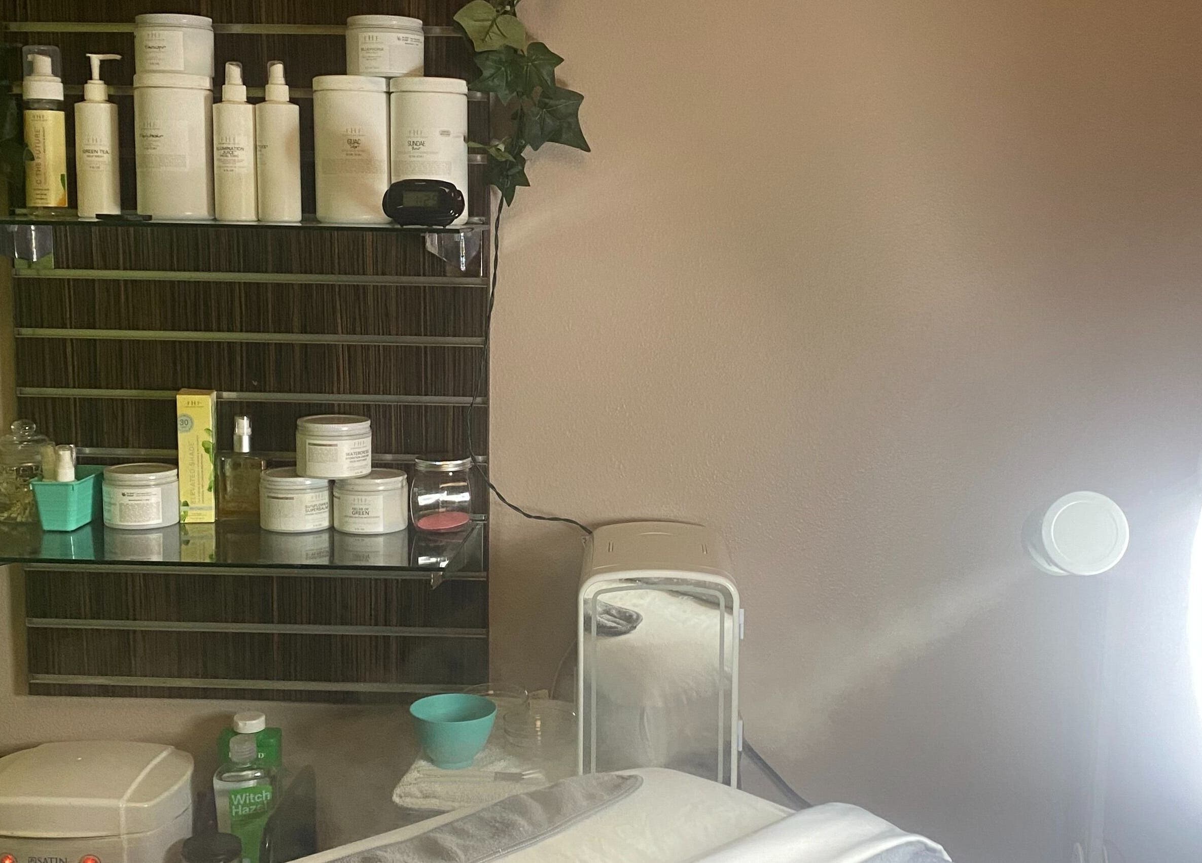 Skincare products on display at Elevation Beauty Studios in Oshkosh, Wisconsin, US, showcasing a tranquil setting.