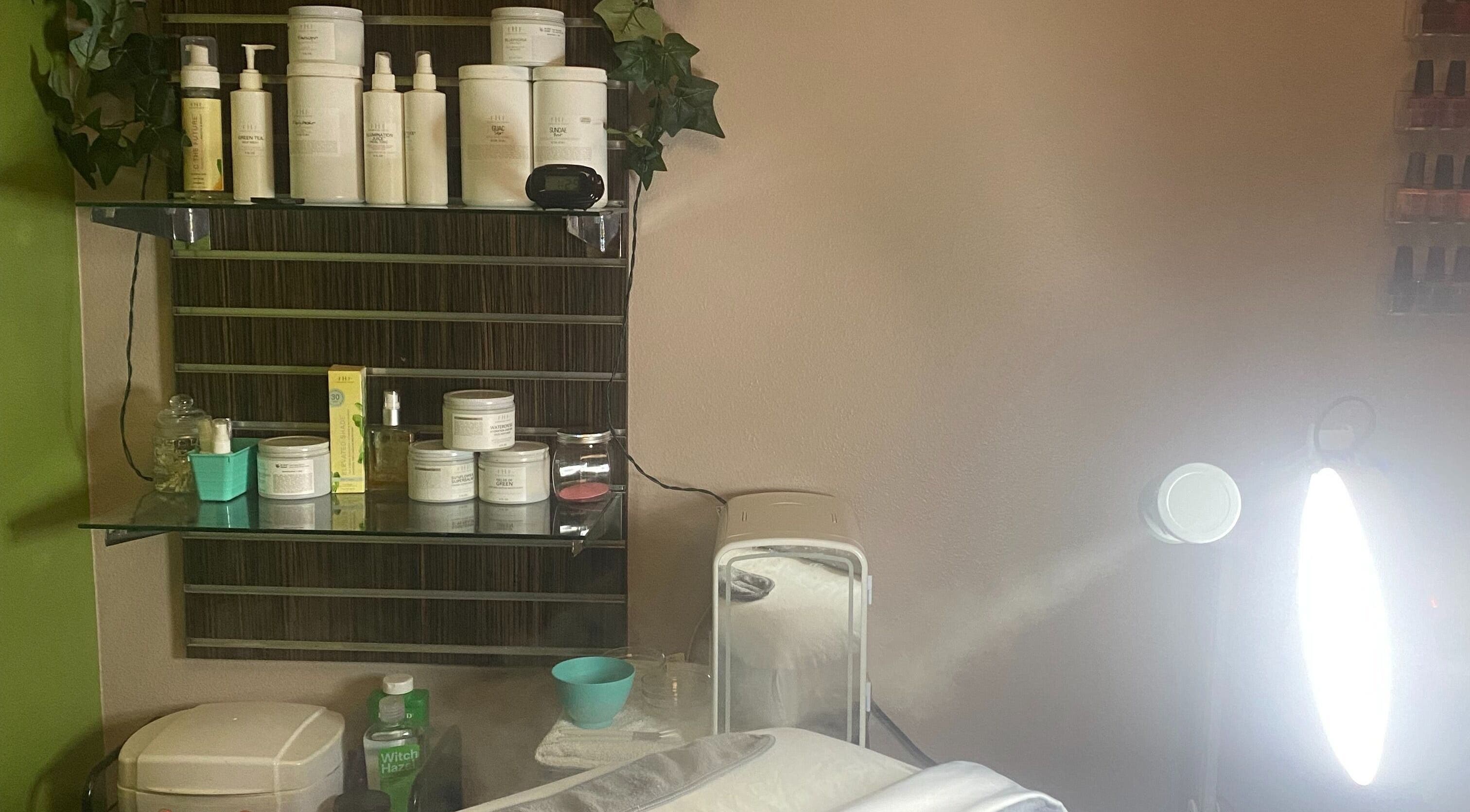 Skincare products on display at Elevation Beauty Studios in Oshkosh, Wisconsin, US, showcasing a tranquil setting.
