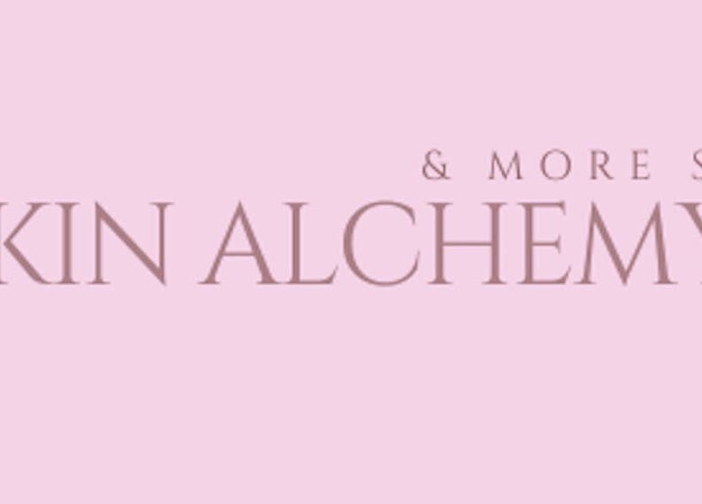 Elegant logo of Skin Alchemy & more spa on a soft pink background, SA address included.