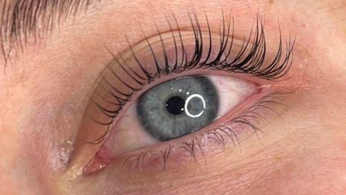 Close-up of enhanced eyelashes at Whimsical Beauty in Falmouth, England, GB for an alluring look.