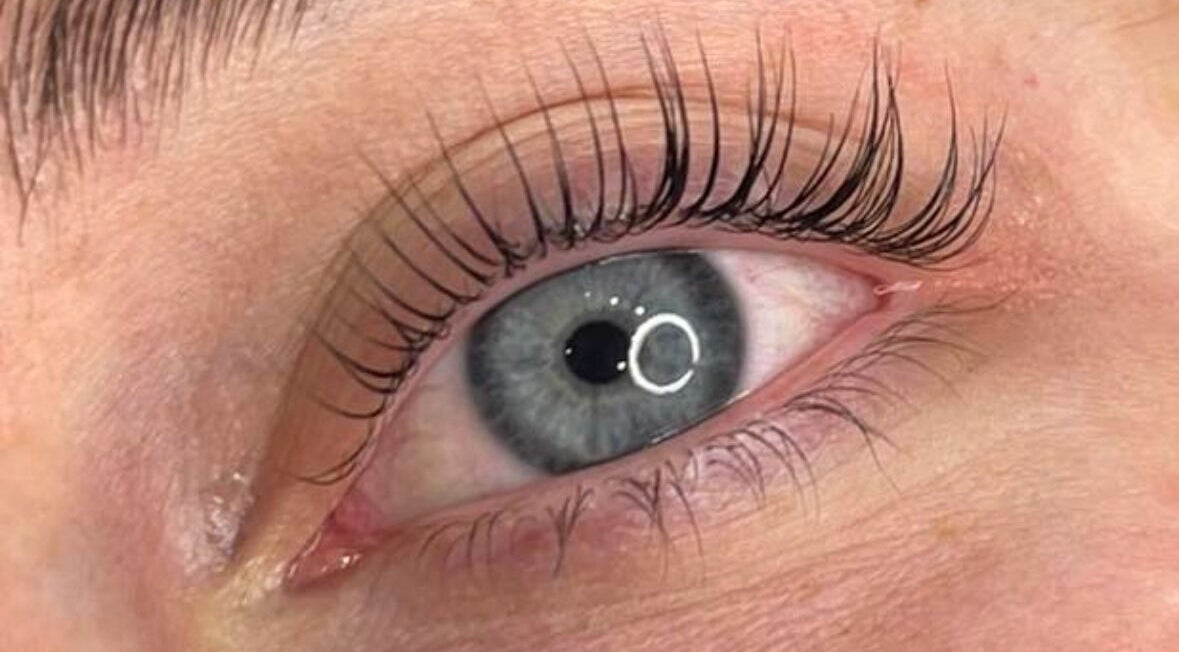 Close-up of enhanced eyelashes at Whimsical Beauty in Falmouth, England, GB for an alluring look.